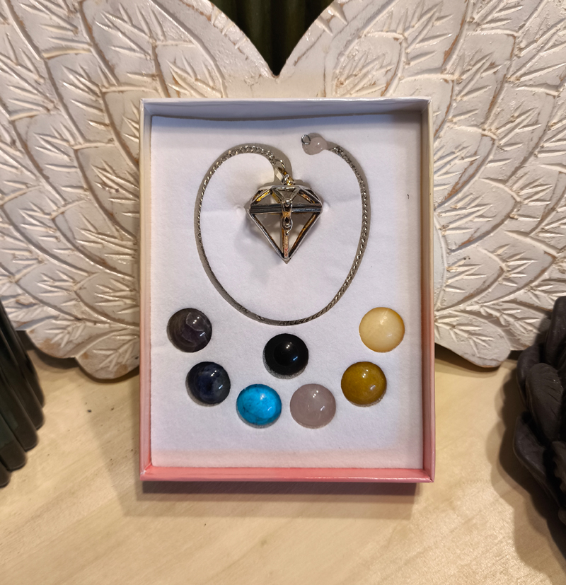 Pendulo cápsula con minerales