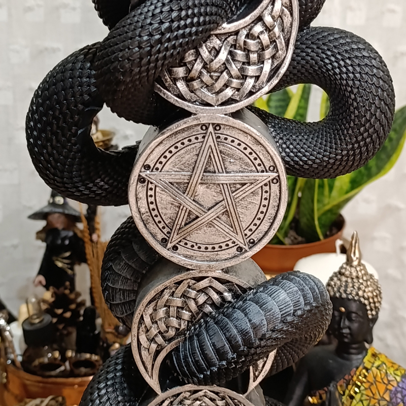 Candelabro triple luna con serpiente