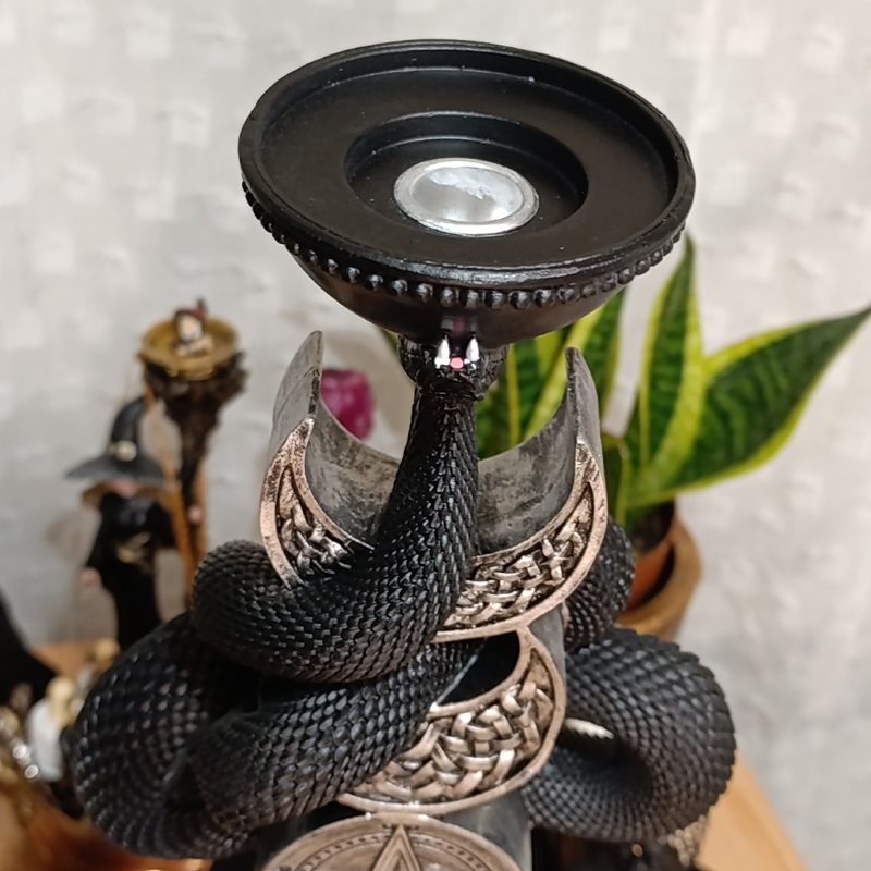 Candelabro triple luna con serpiente