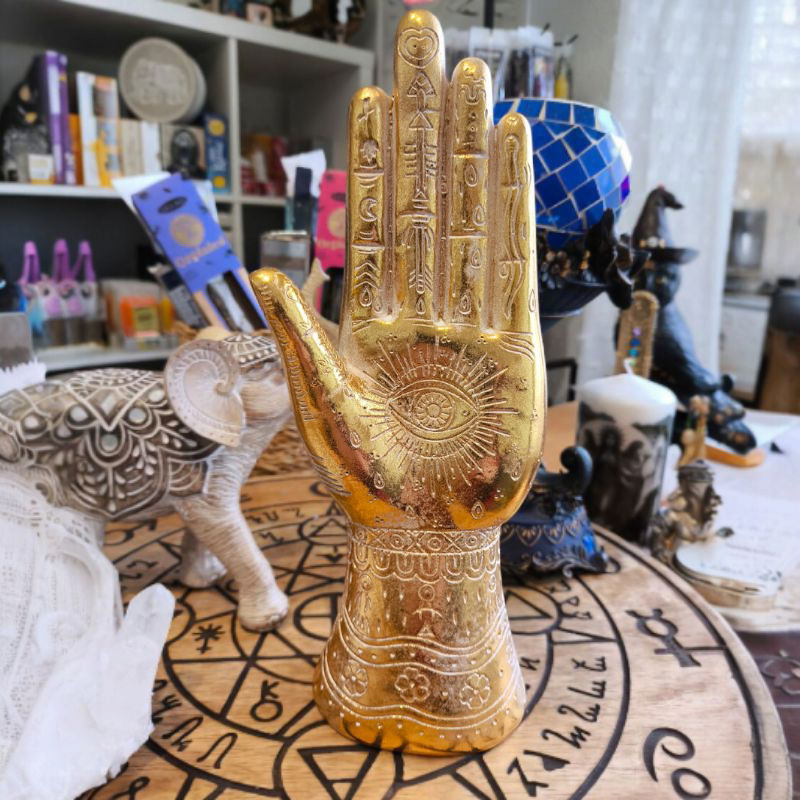 Escultura de Mano Dorada