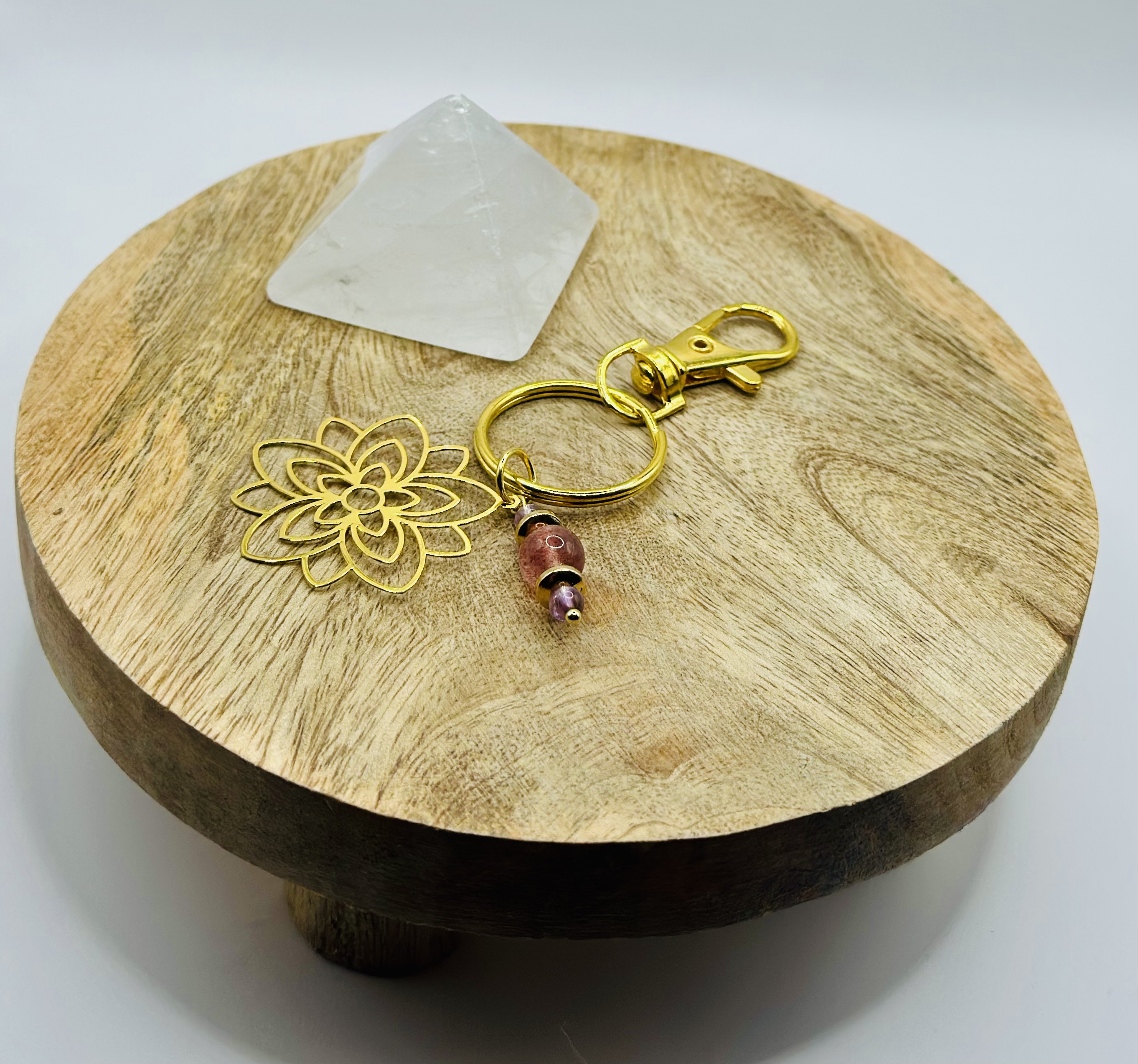 Portes clés fleurs dorées