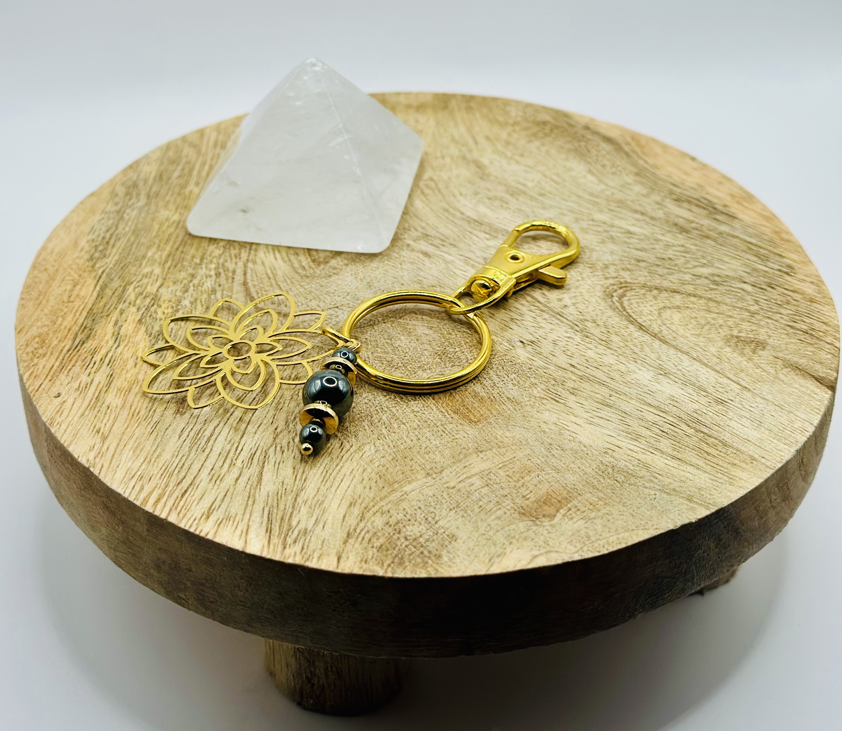 Portes clés fleurs dorées