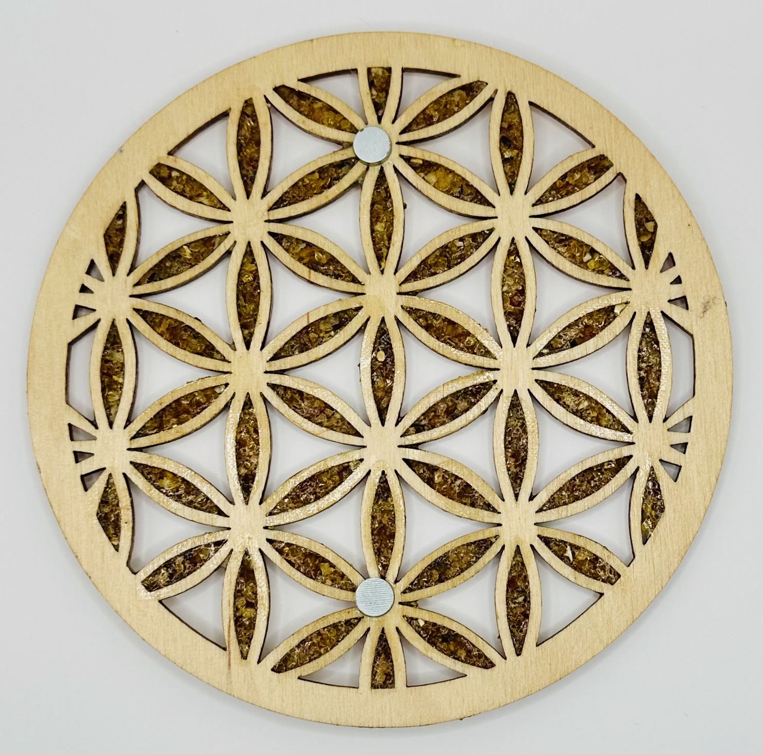 Fleur de vie incrustée d'ambre