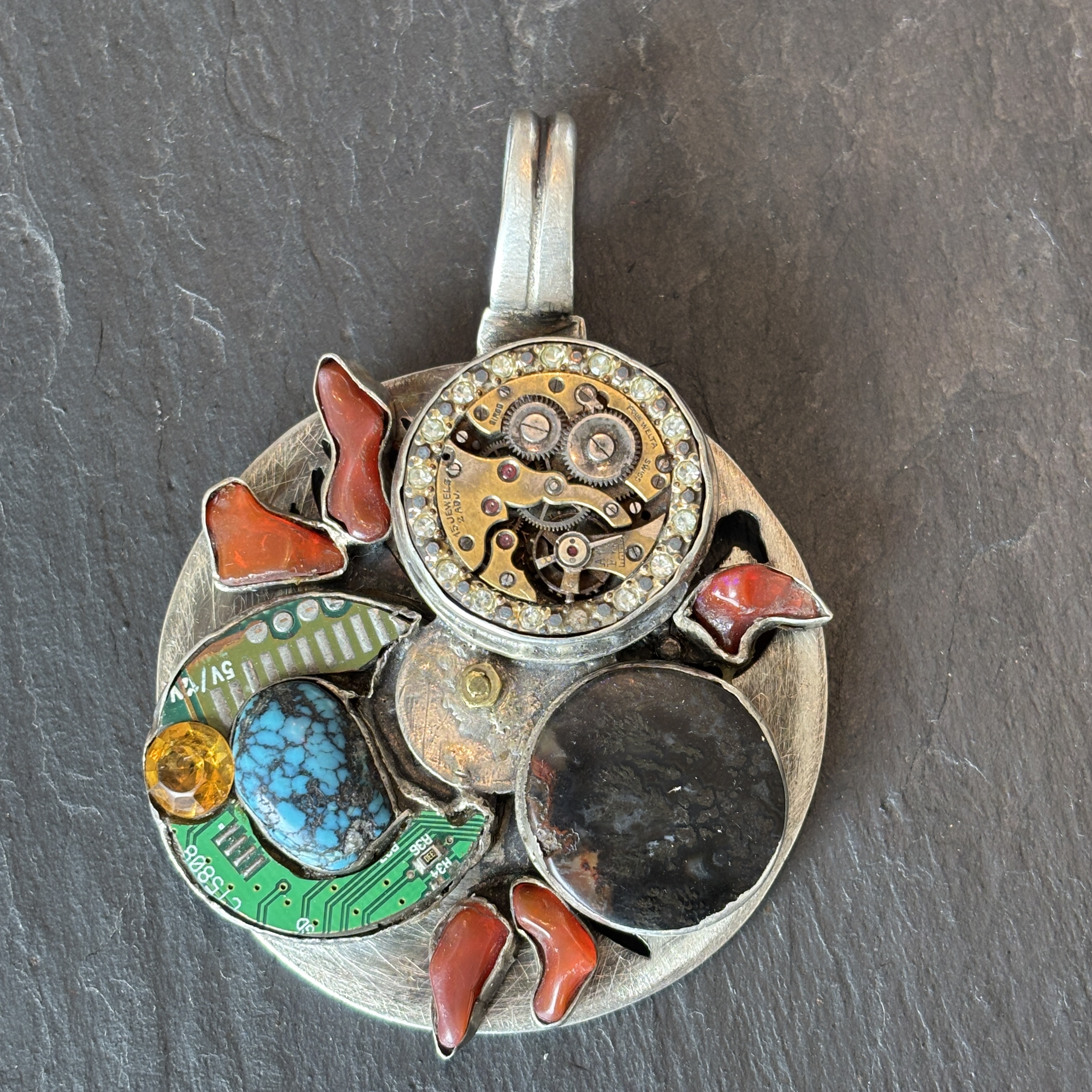 Robert Mac Eustace Jones, Zuni Procession of the Equinox Articulating Sterling Pendant