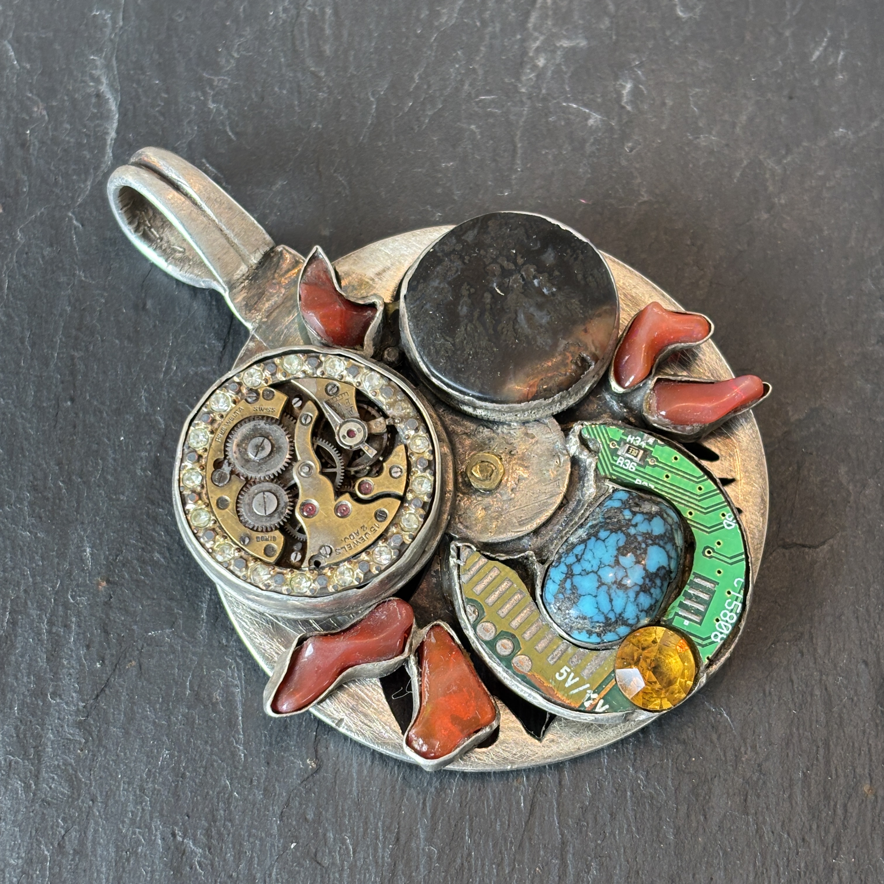 Robert Mac Eustace Jones, Zuni Procession of the Equinox Articulating Sterling Pendant 