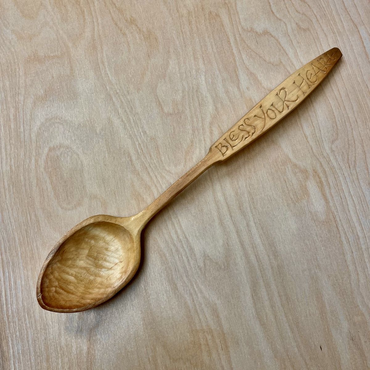 13" Cooking spoon with hand-carved lettering or design