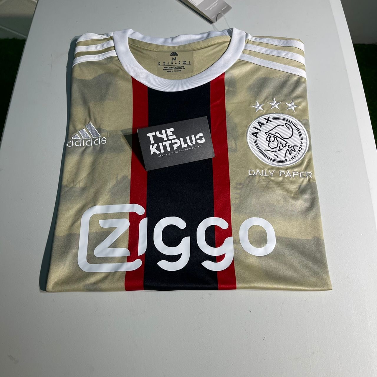 2022/23 Ajax Third Shirt – Adidas x Daily Paper – Gold, Black & Red