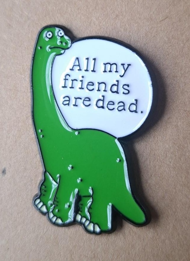 Dead Friends Dinosaur Pin
