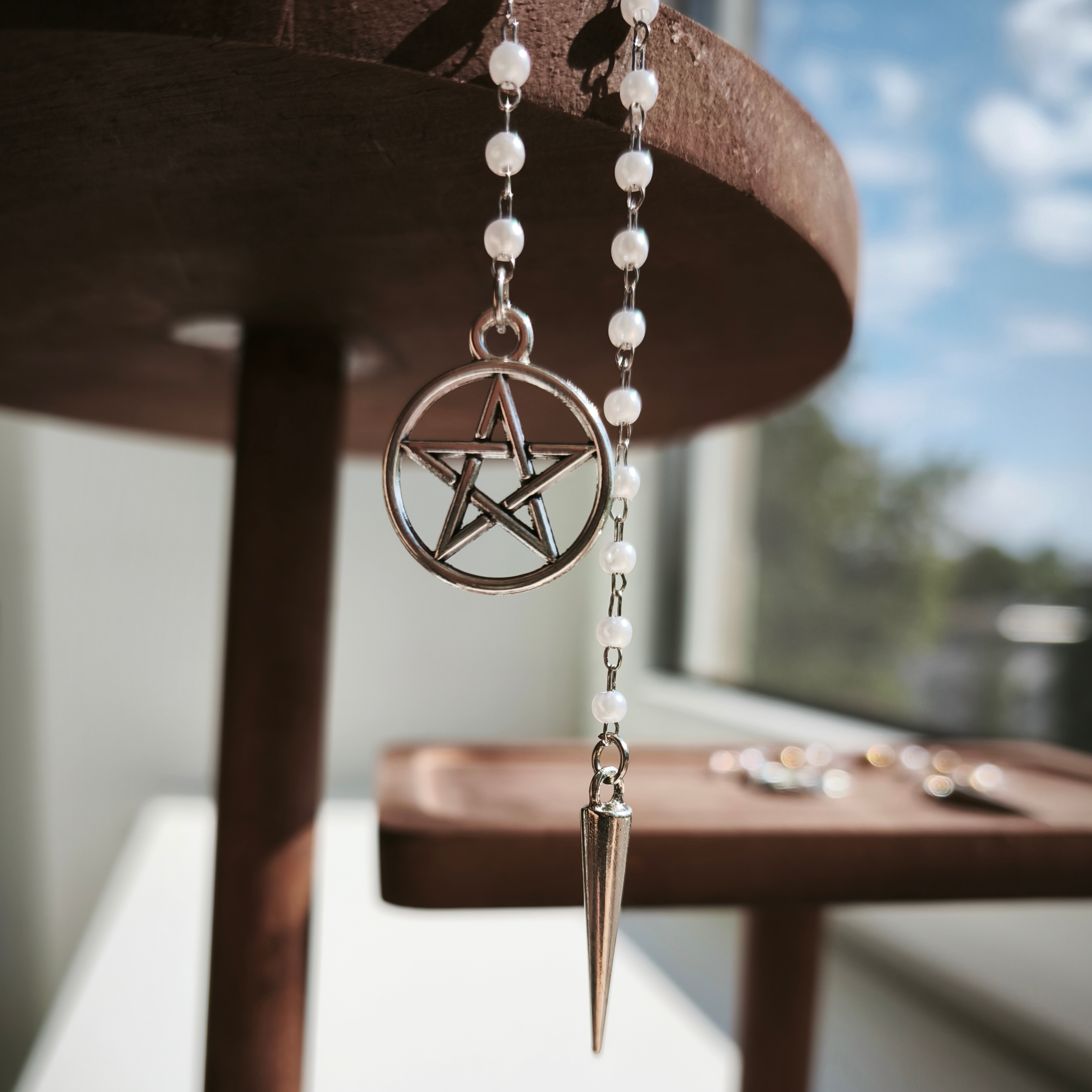 Švytuoklė  „Baltasis perlas“