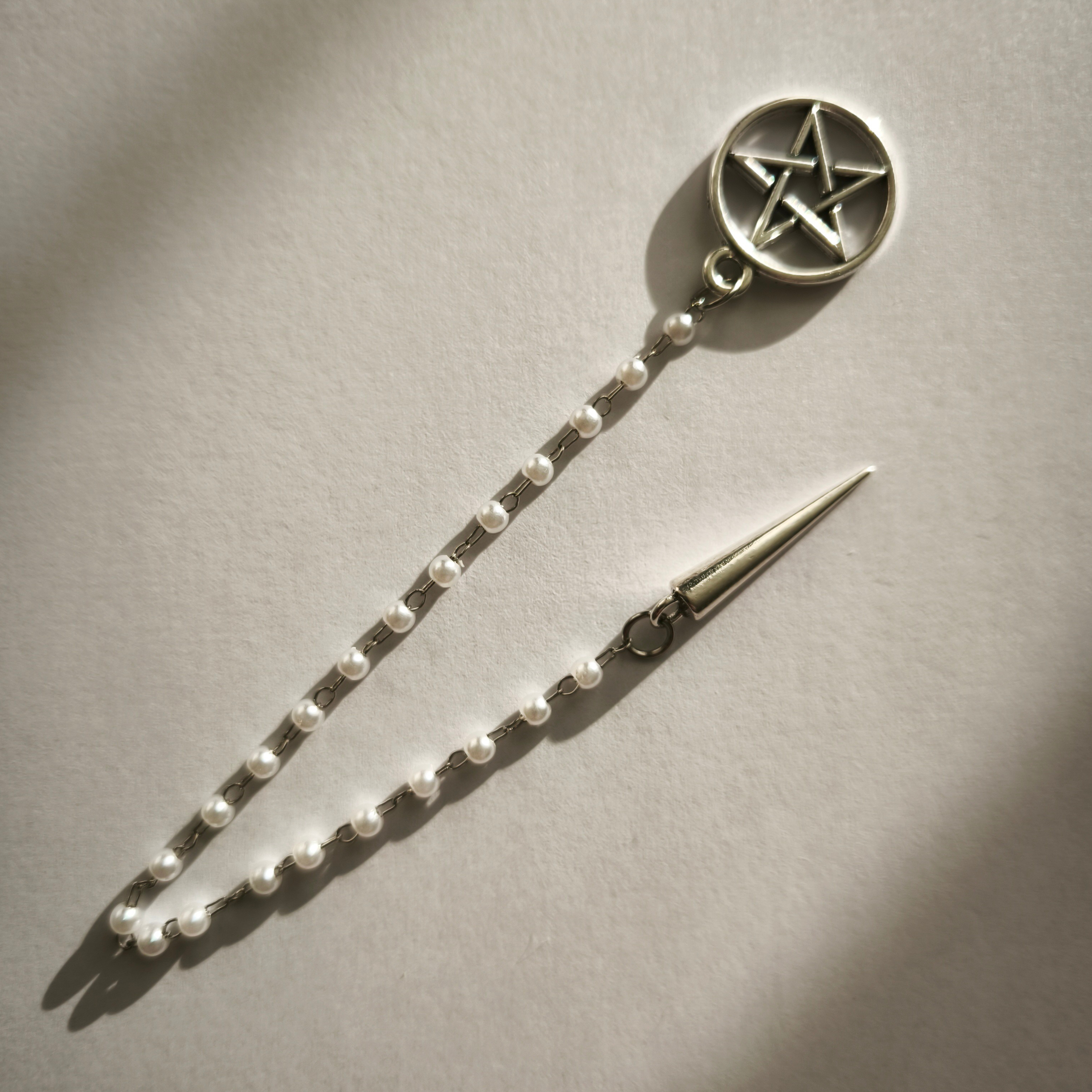 Švytuoklė  „Baltasis perlas“