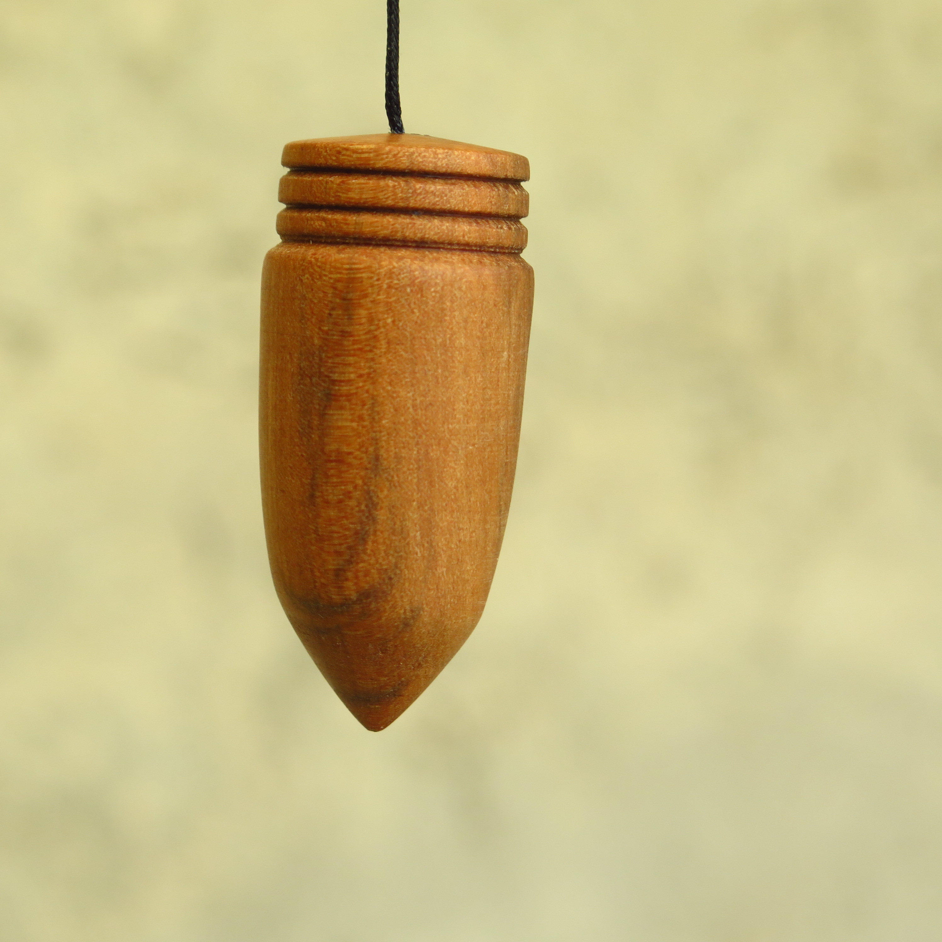 Pendule en bois de poirier