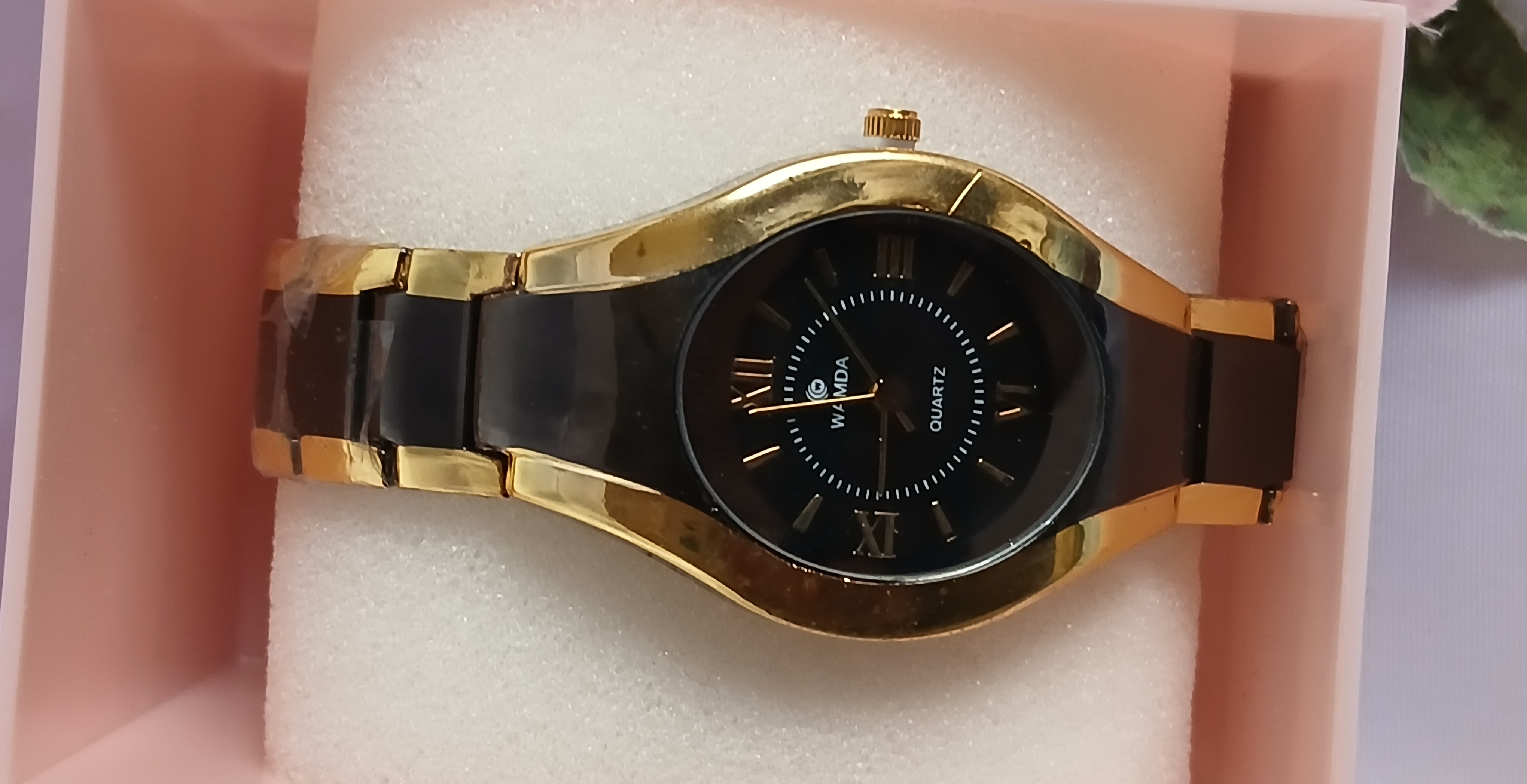 Gold and Black Wristwatch