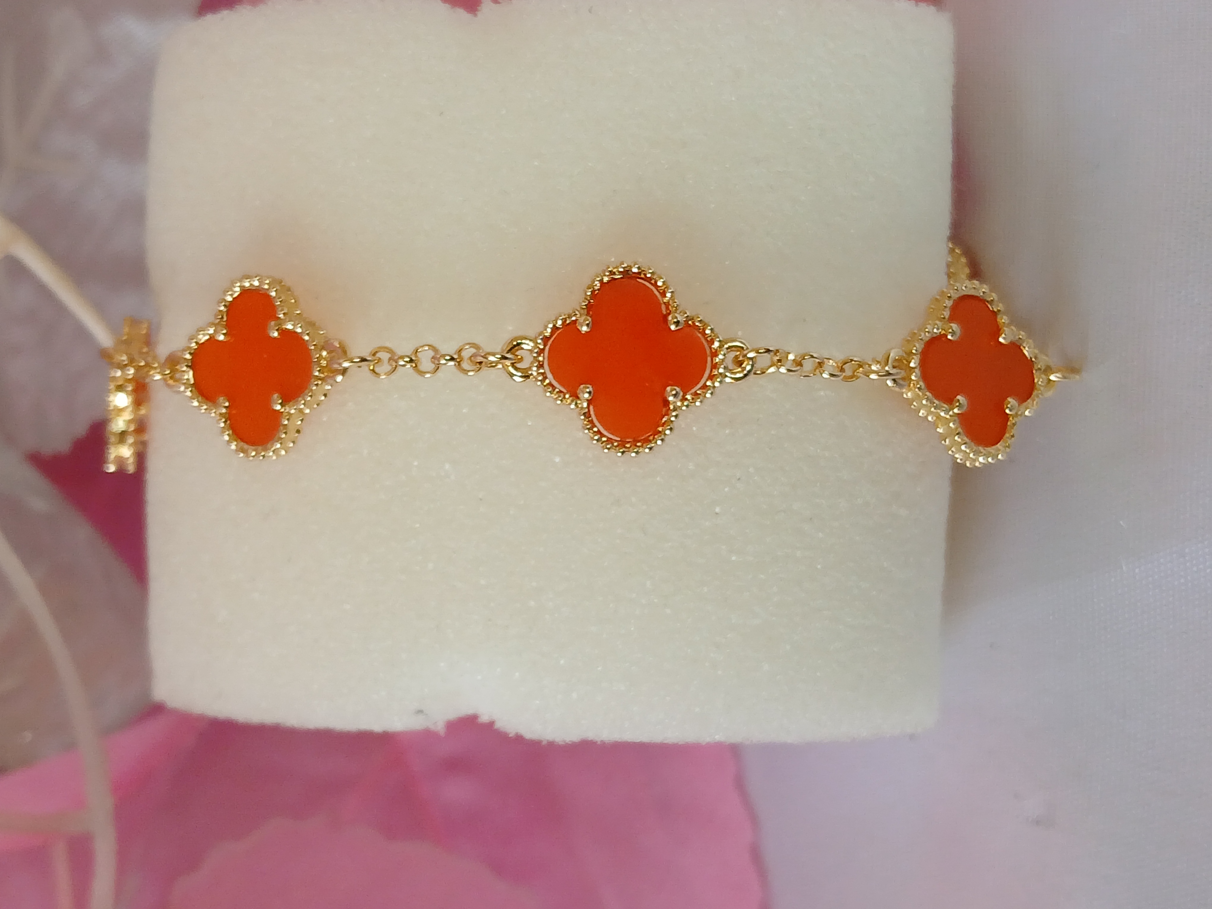 Gold Bracelet with Orange Clover Charms