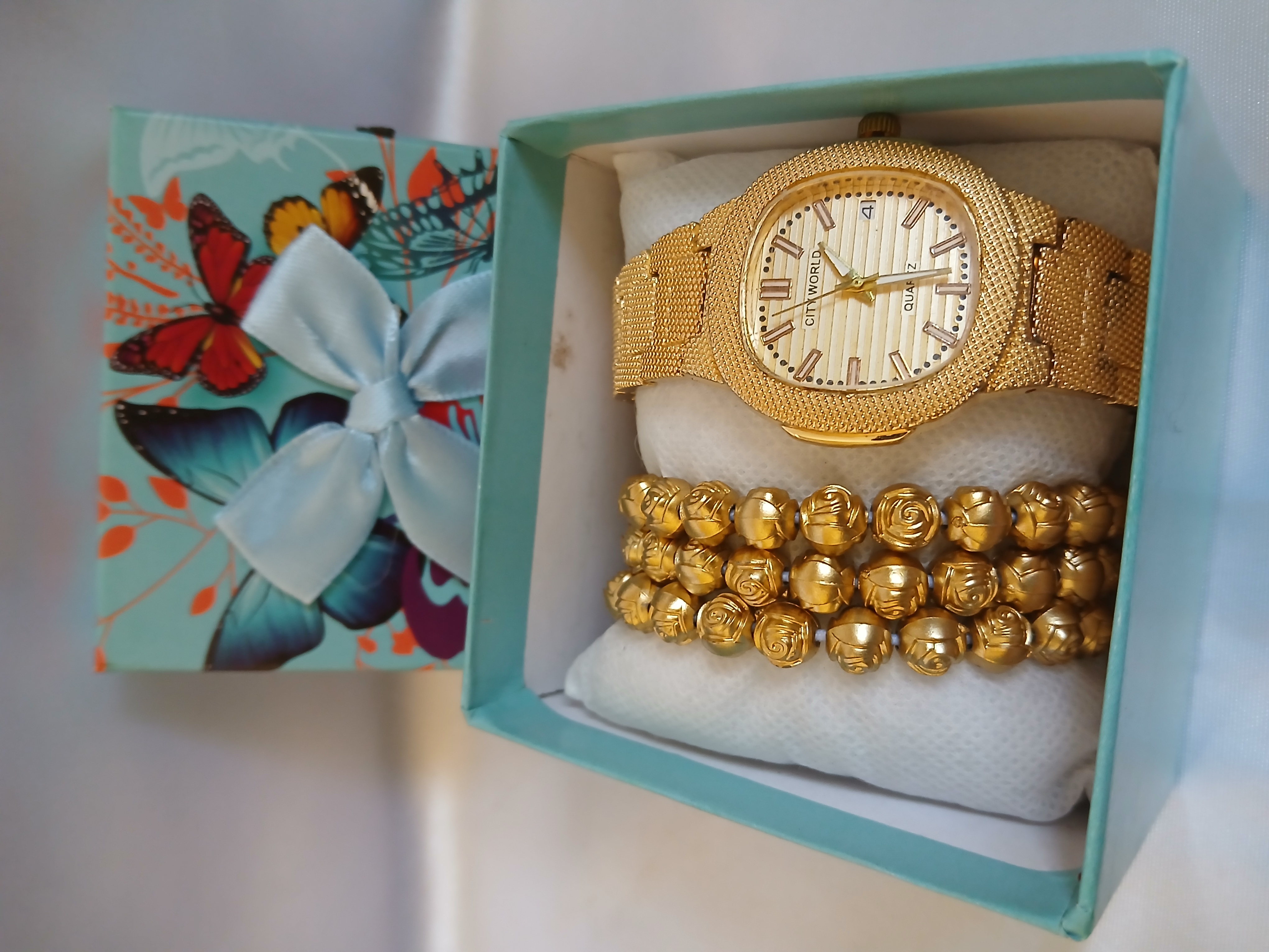 Elegant Gold Watch and Bracelet Set