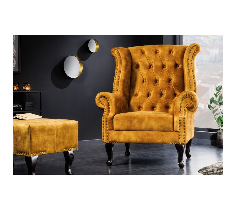 Chesterfield armchair Cella with velvet upholstery in mustard yellow with dark brown solid legs 105cm