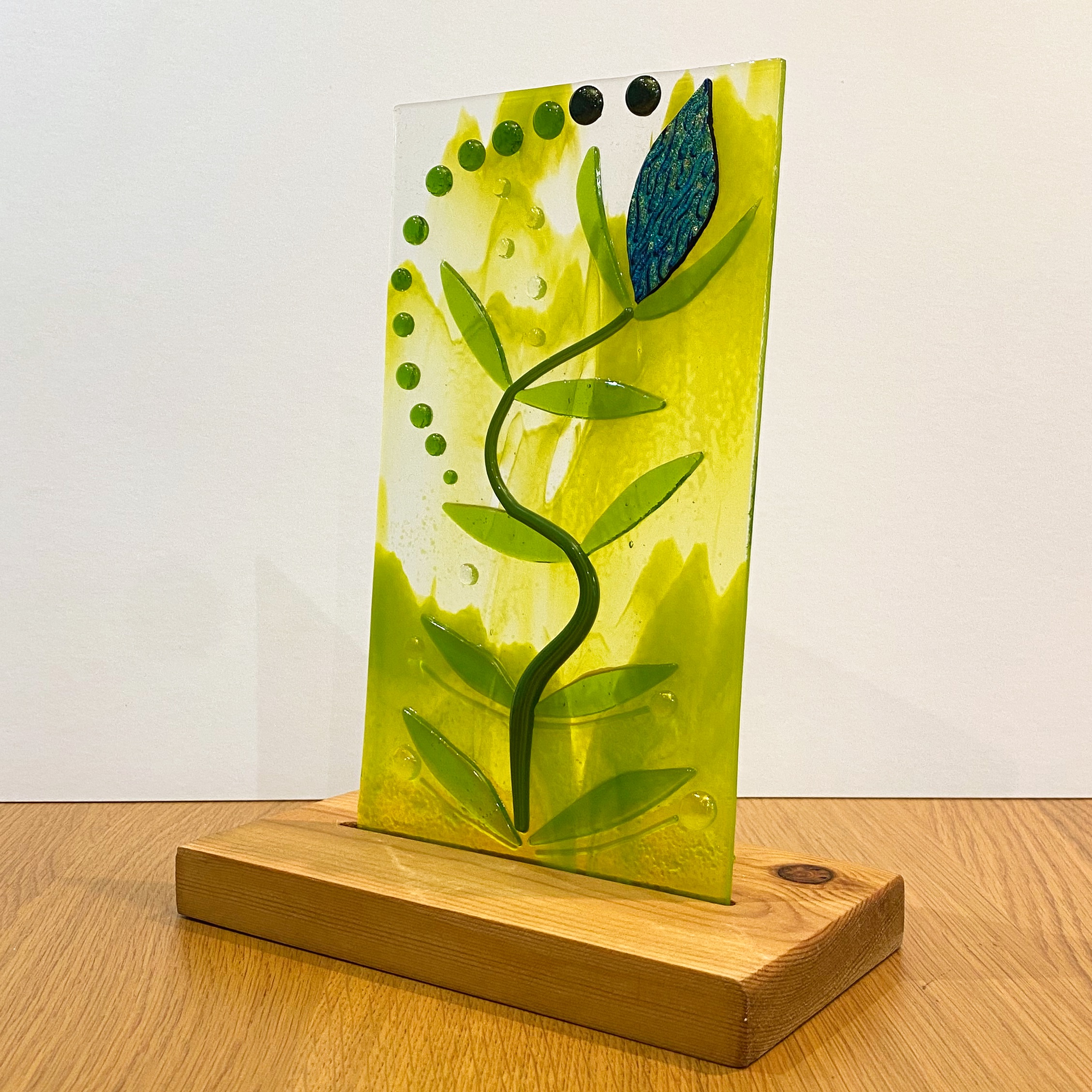 Dichroic Blue flower bud and leaves