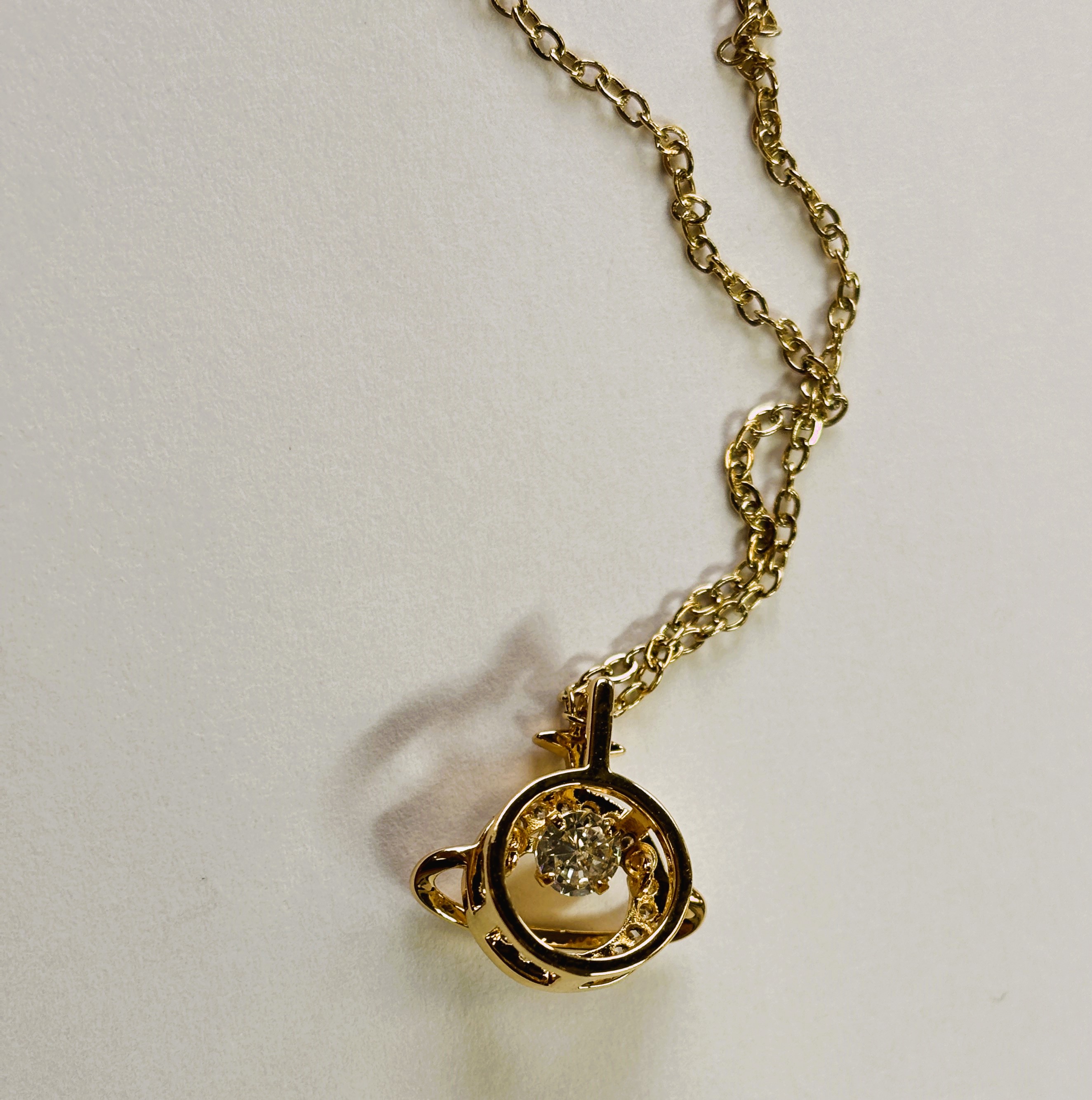 Exotic Gold Pendant Necklace with Floating Charm