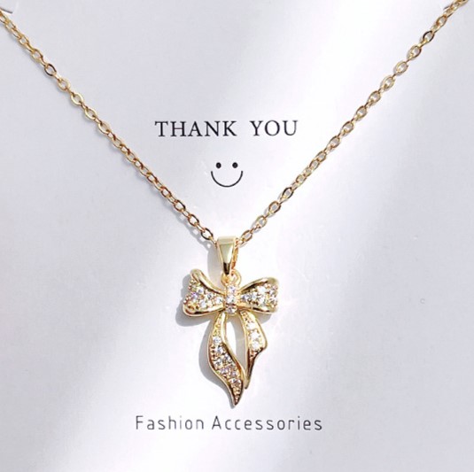 Large Gold Bow Pendant Necklace with Zircon Sand Coat