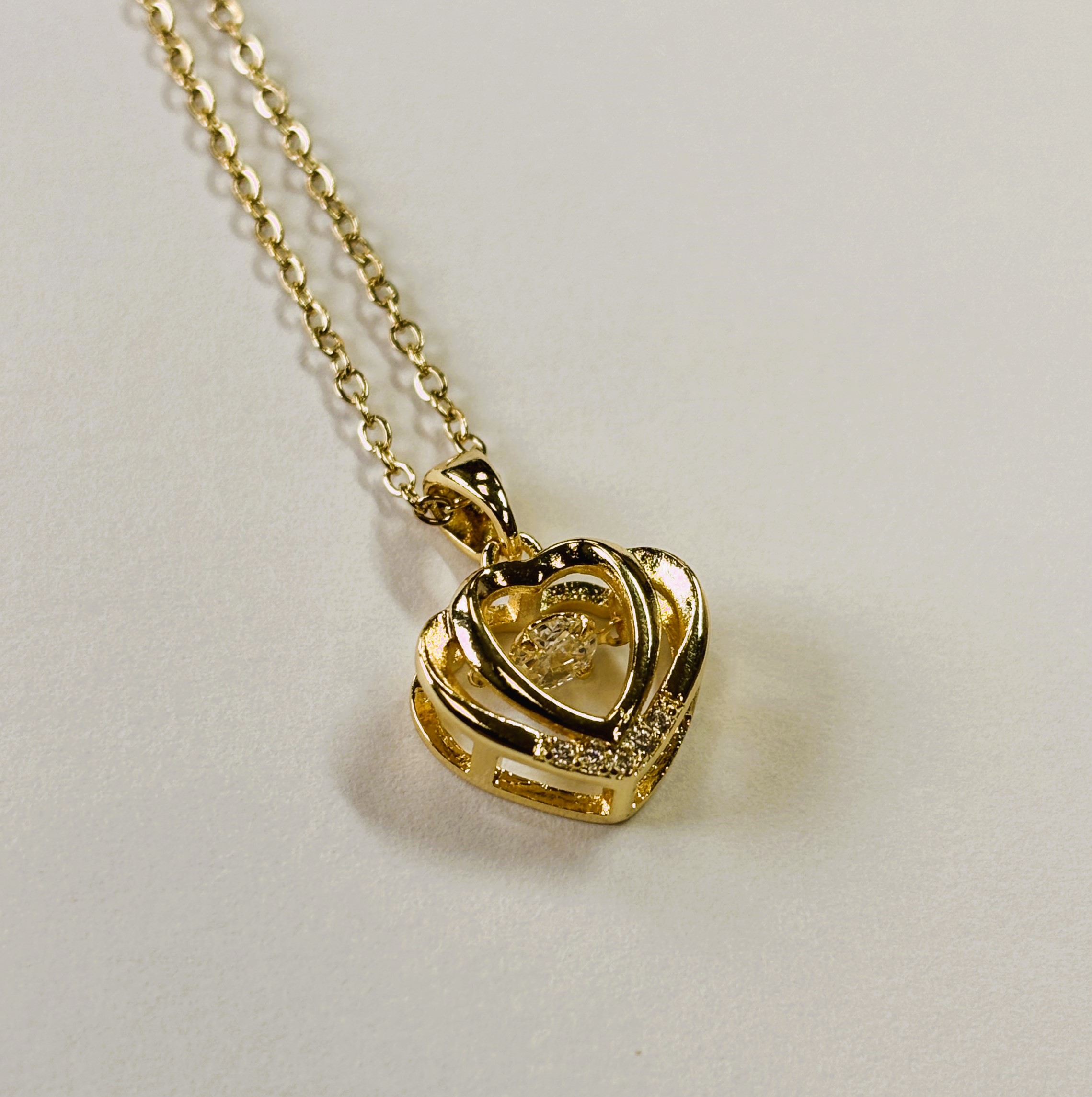 Gold Zircon Concentric Hearts with Round Cut Floater Pendant Necklace