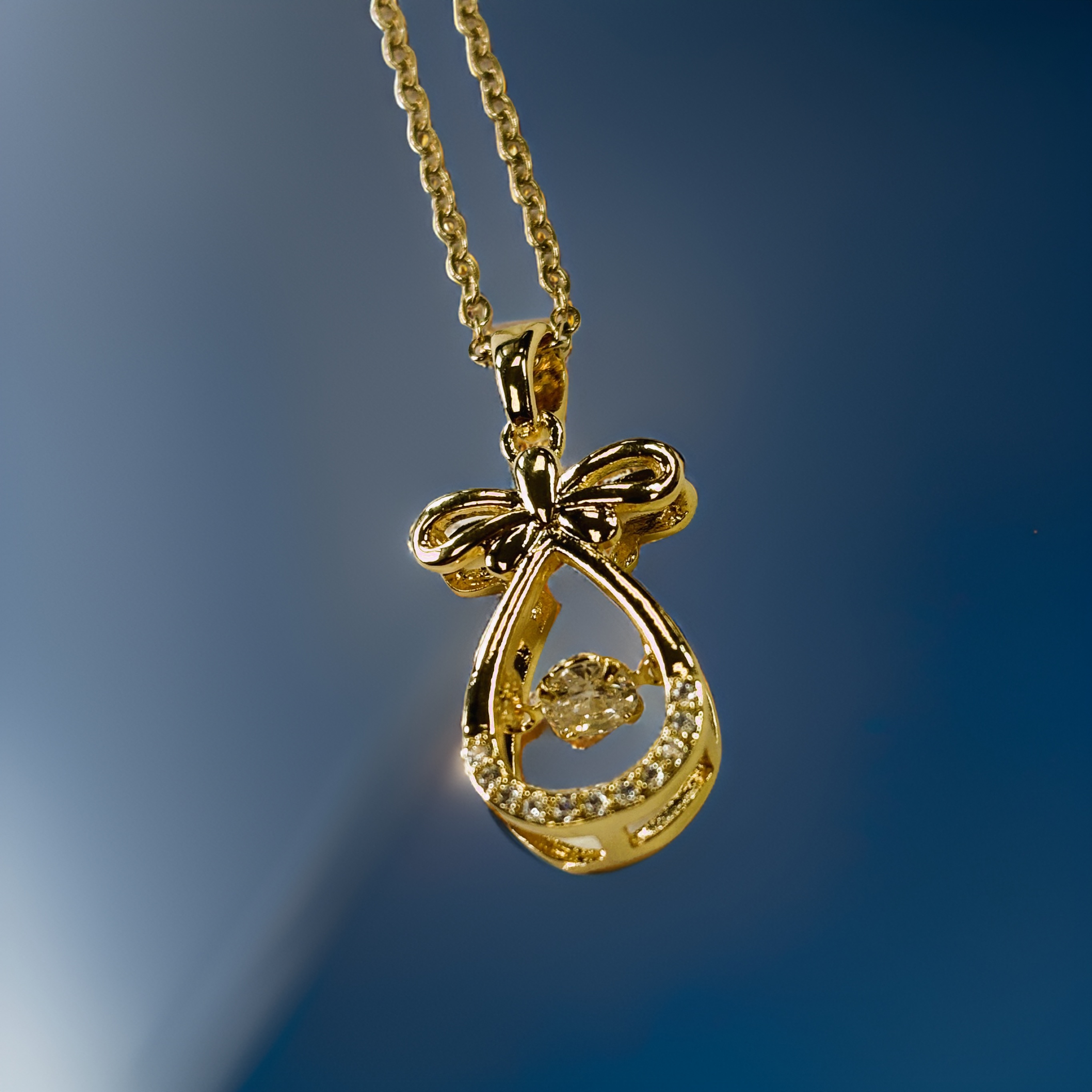 Gold Goodie Bag with Round Cut Zircon Floater Pendant Necklace