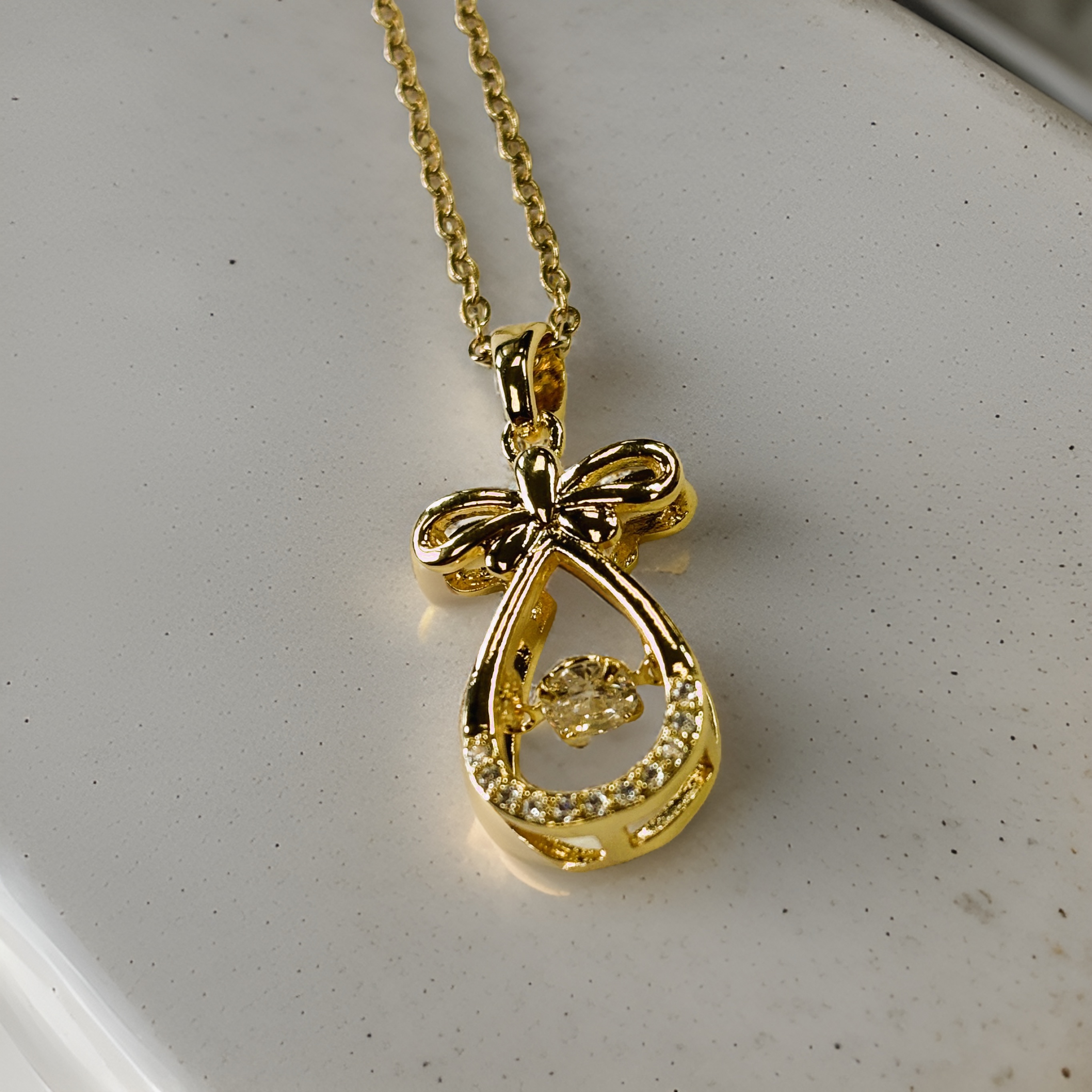 Gold Goodie Bag with Round Cut Zircon Floater Pendant Necklace