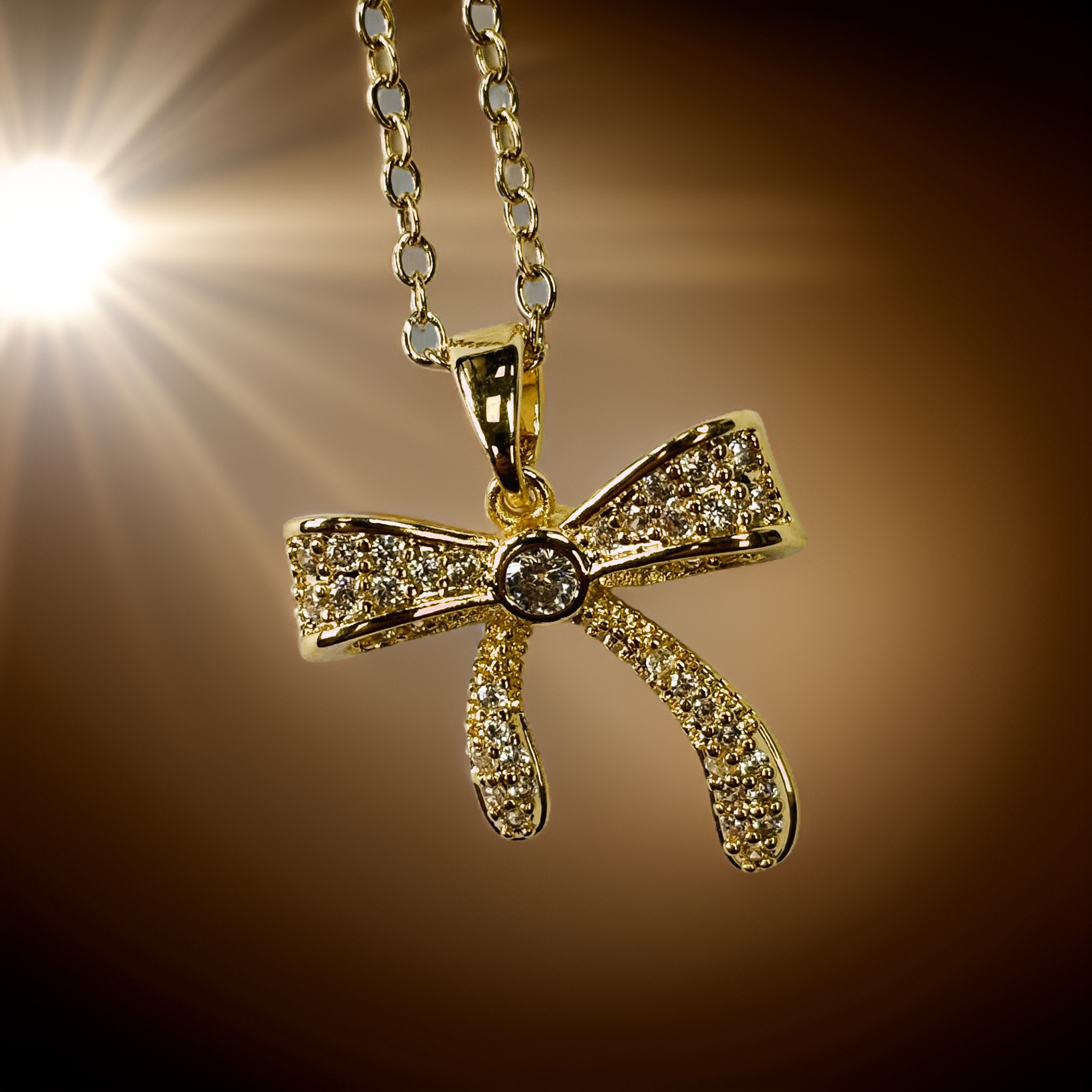 Gold Relief Zircon Sand Gift Bow Pendant Necklace