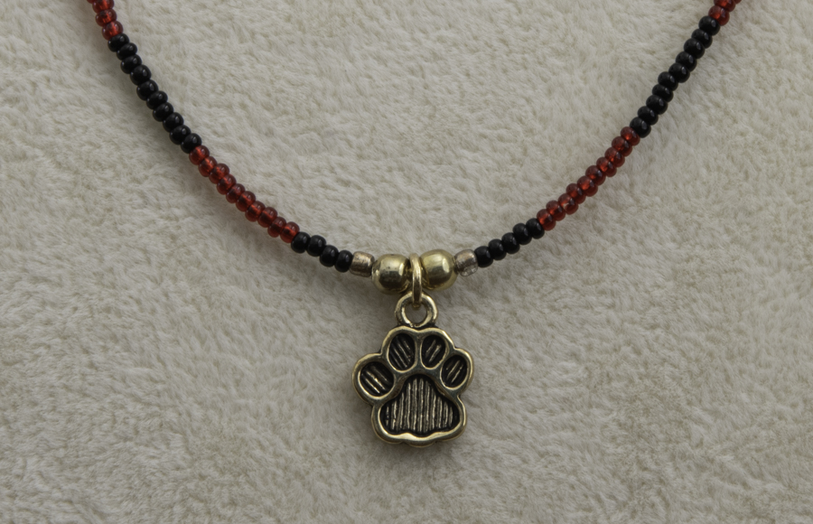 Detail of Paw Print Pendant Necklace