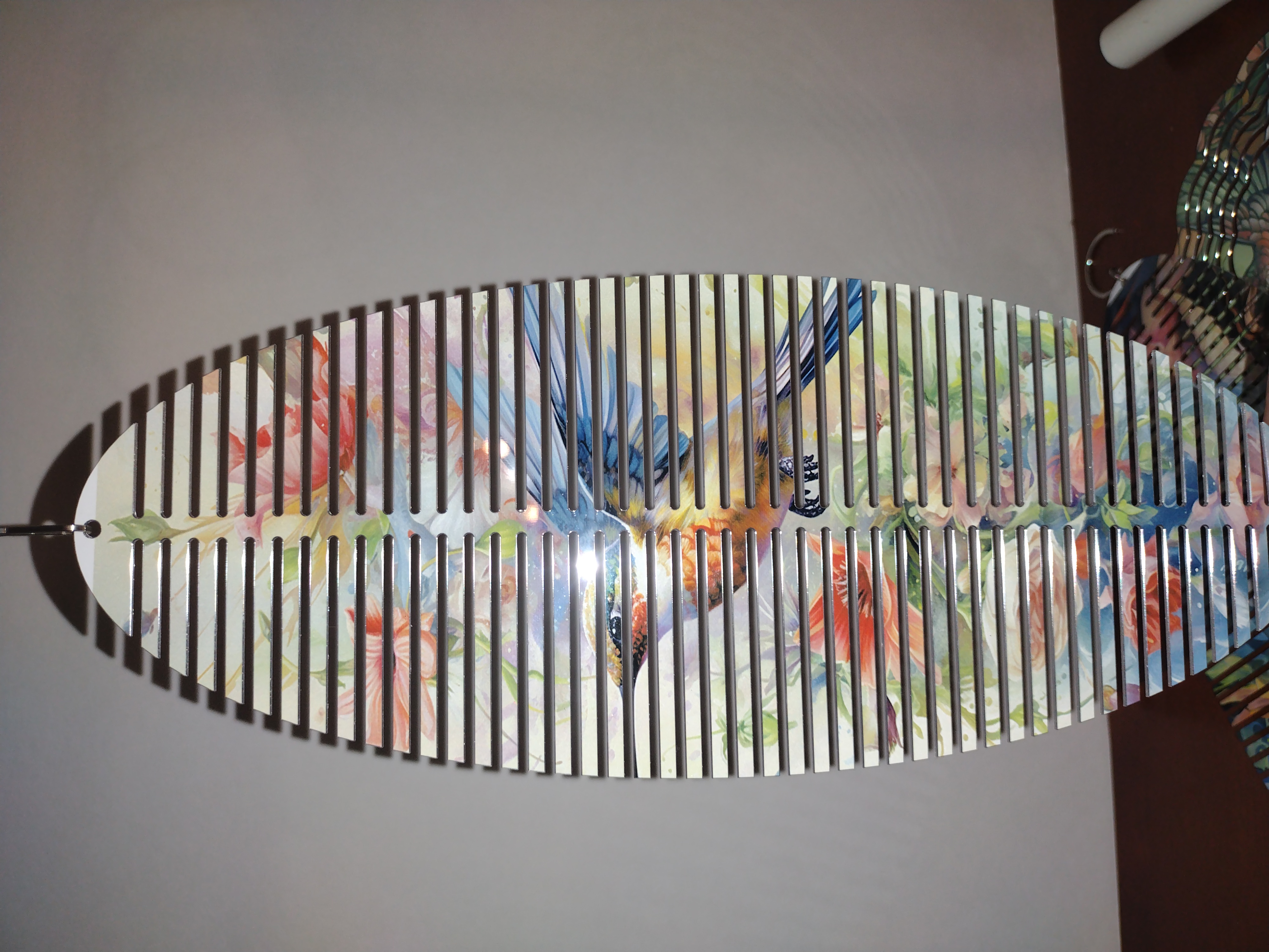 Hummingbird themed 11-inch spiral wind spinner