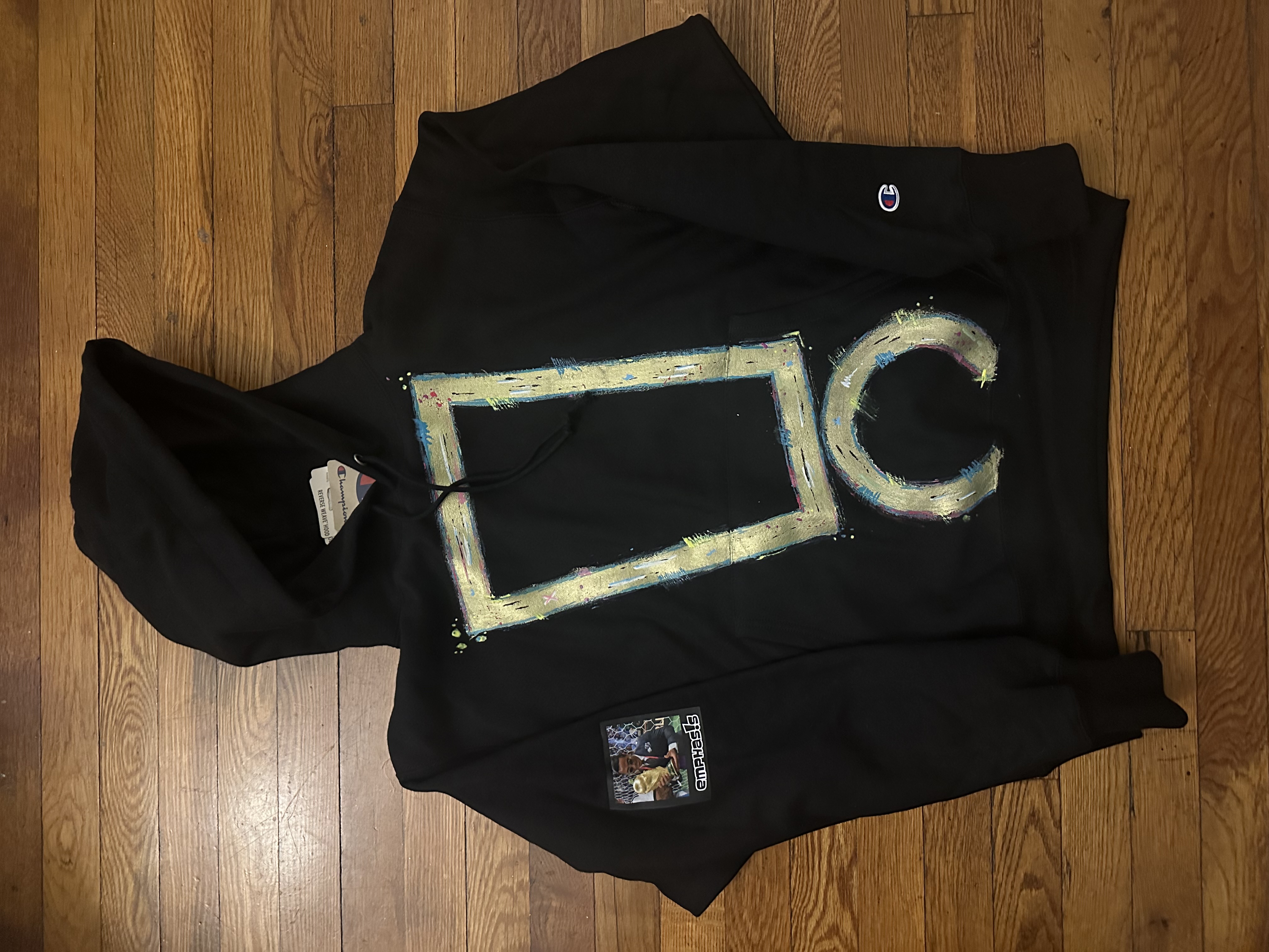 Green ice on black hoodie