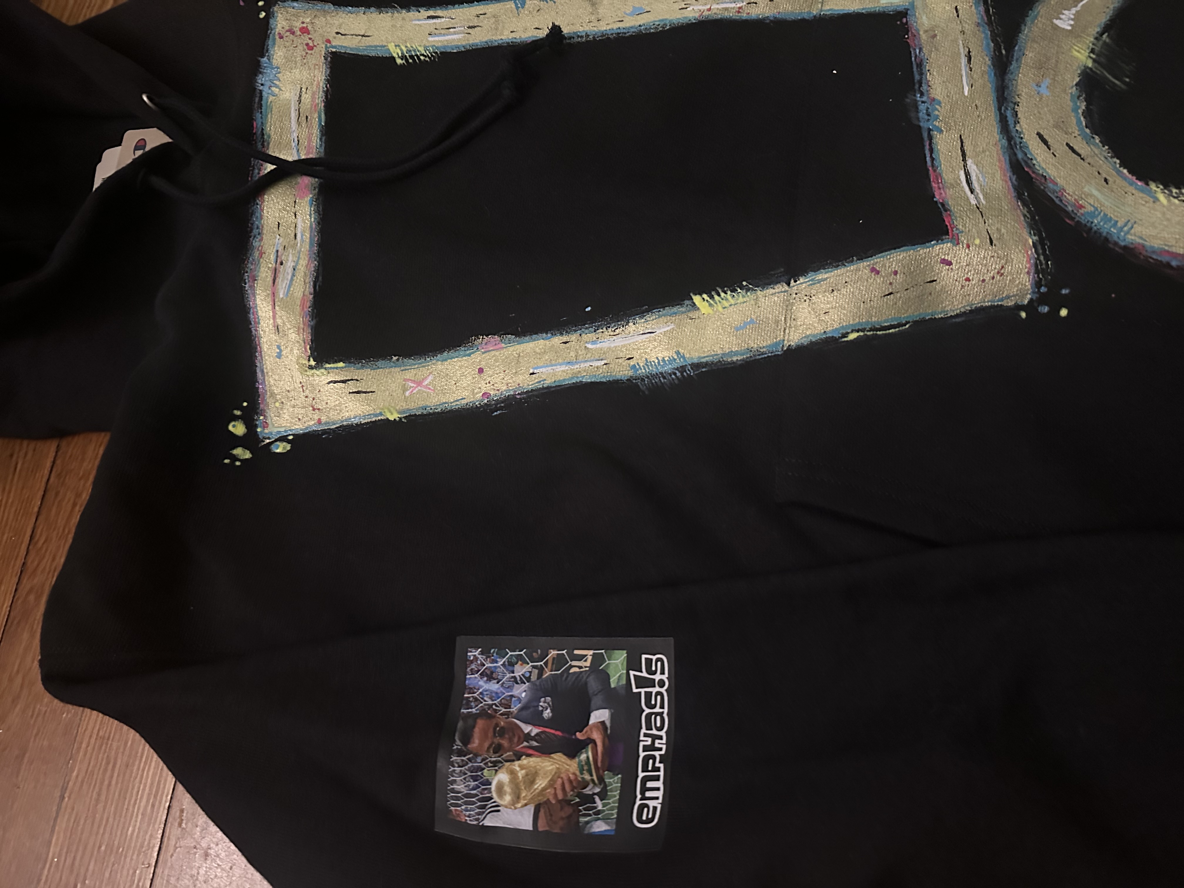 Green ice on black hoodie