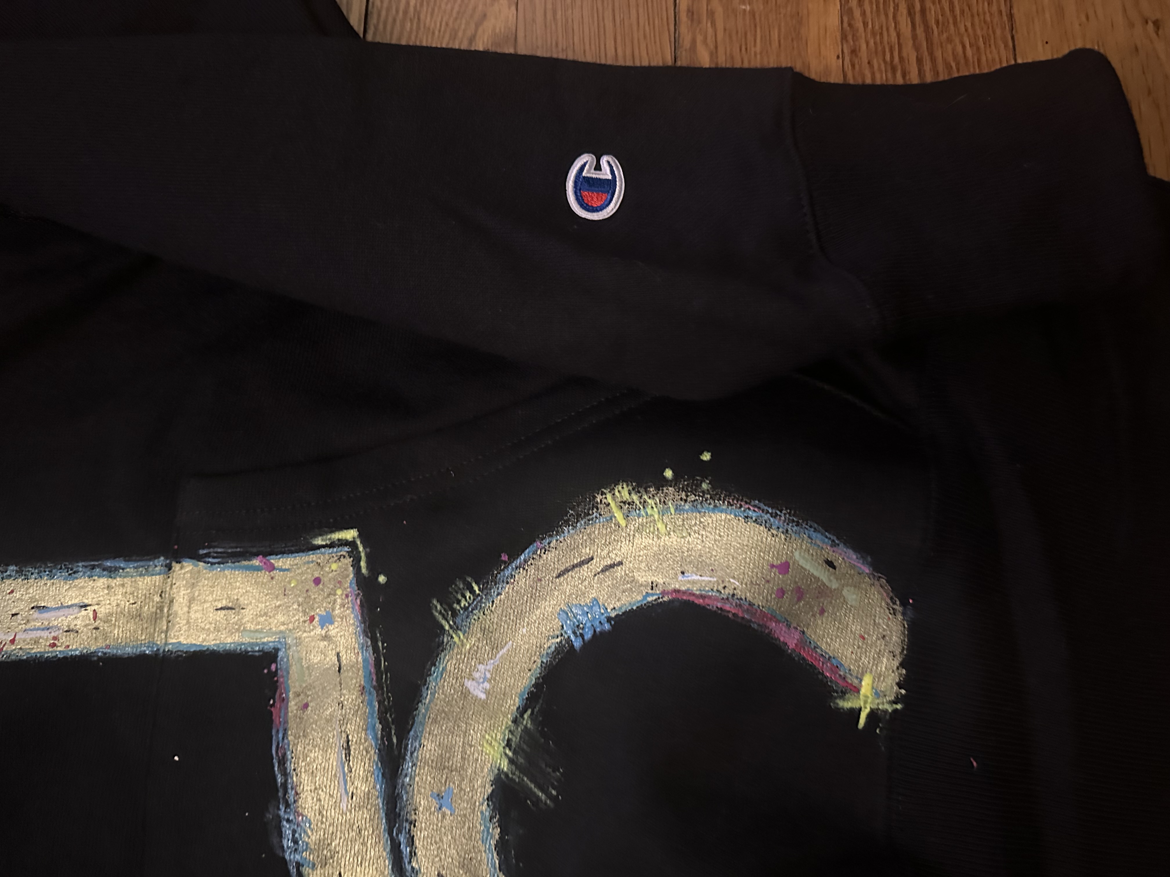 Green ice on black hoodie