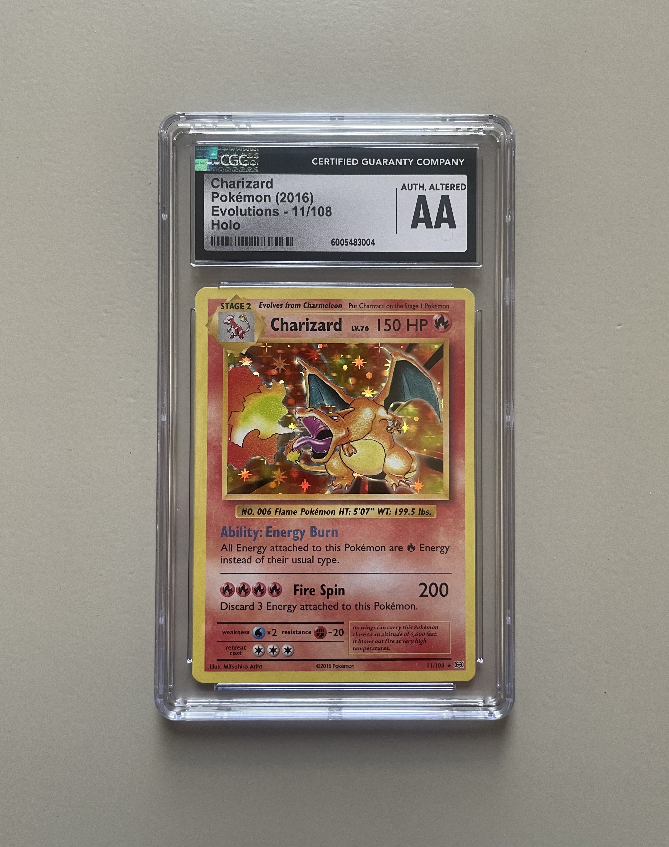 Charizard Pokémon Evolutions 11/108 Holo CGC AA