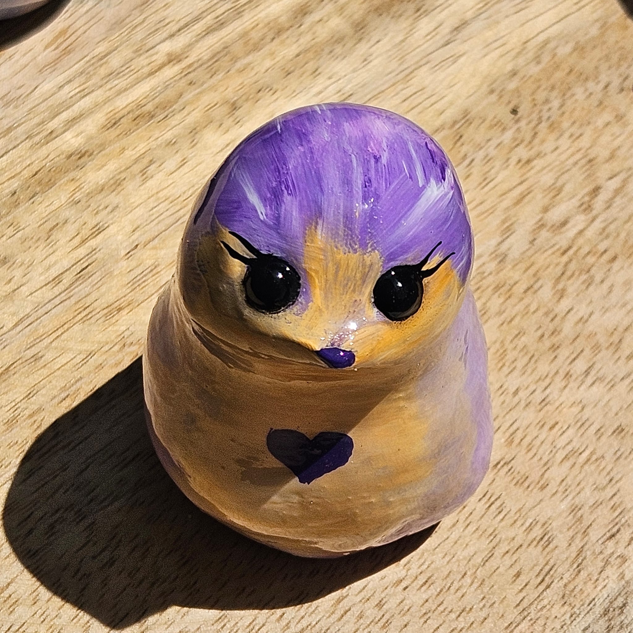 Moineau de tendresse violet