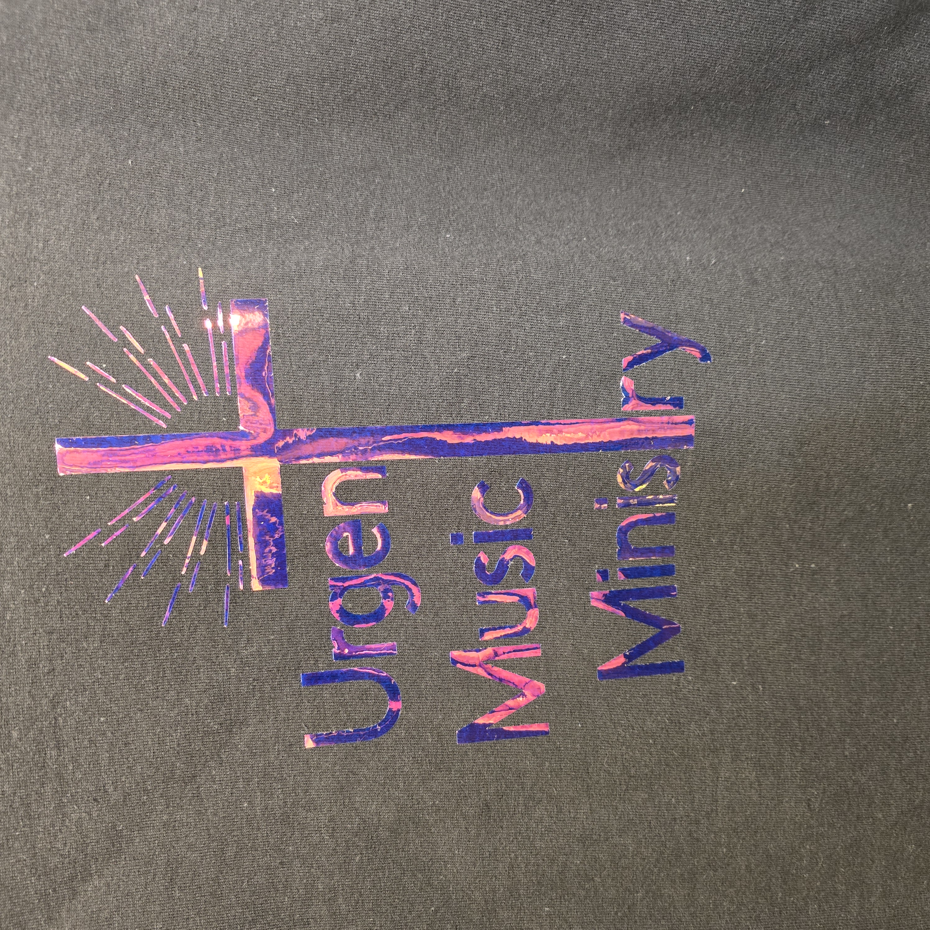 Black T-Shirt with U.M.M. logo in shiny, color changing print.