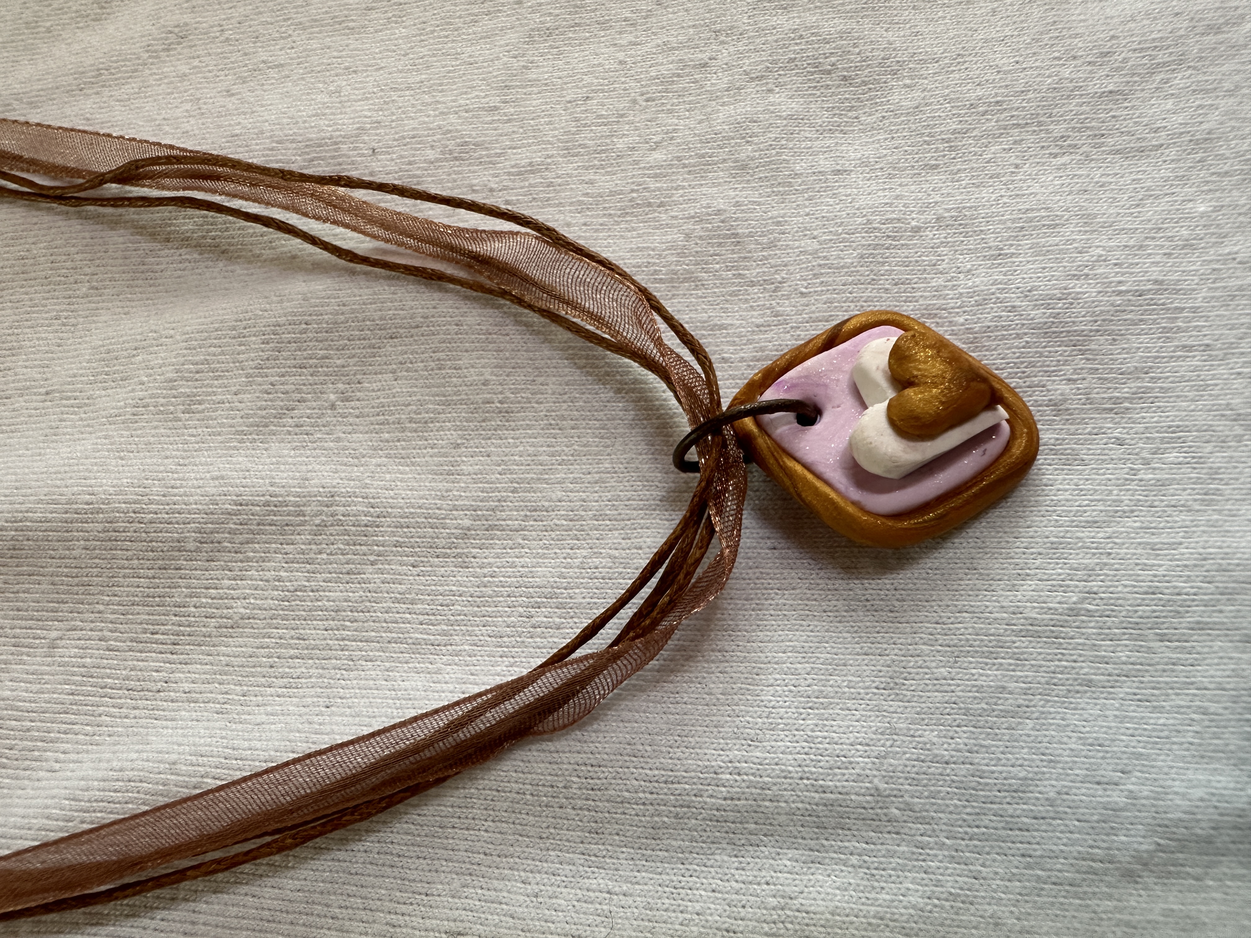 God's Love in My Heart necklace, copper, lavender and white polymer, ribbon and brown strands