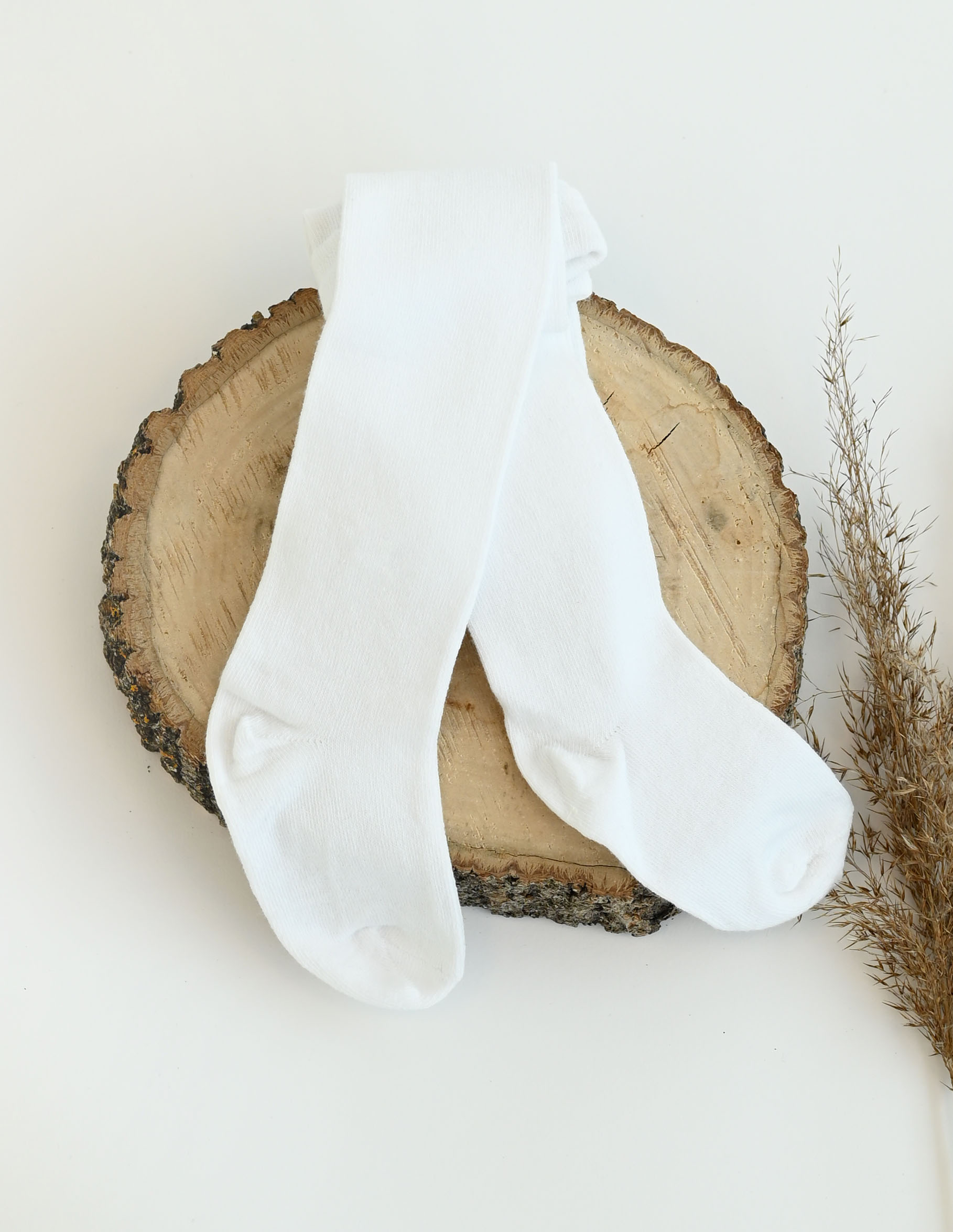 Baltos vaikiškos pėdkelnės