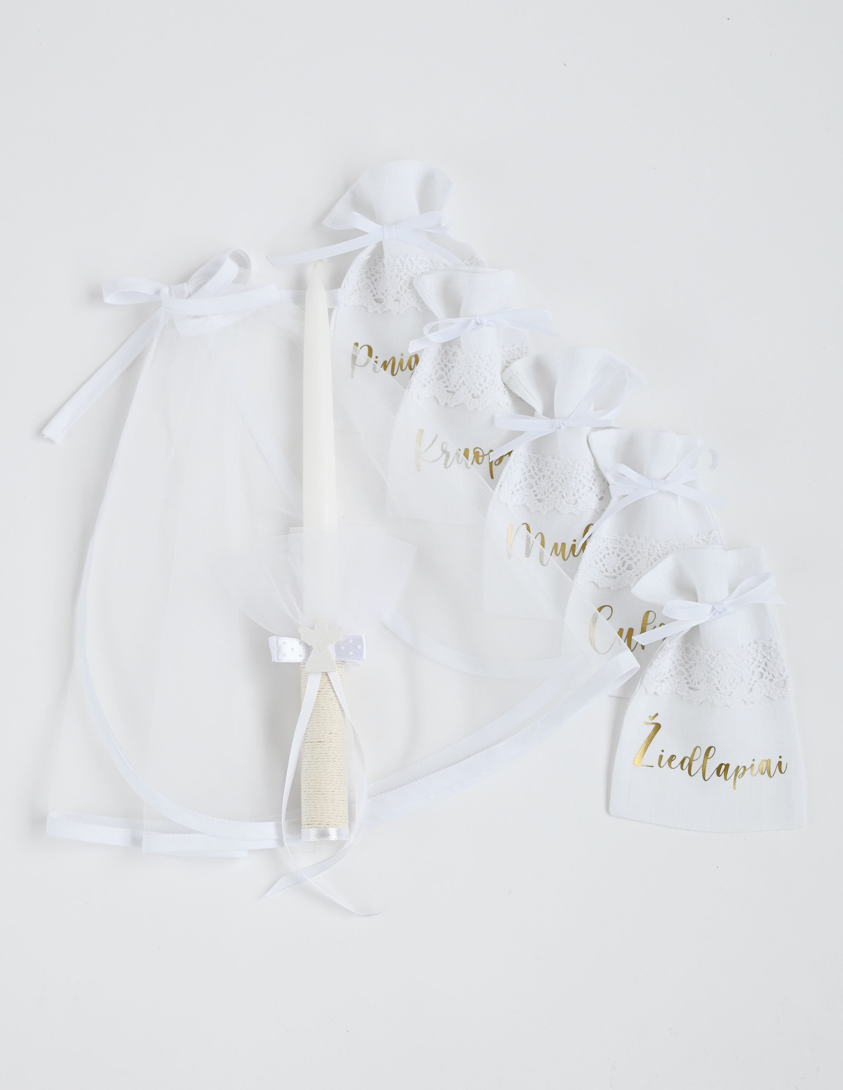 Krikšto skraistės, žvakės ir maišelių rinkinys