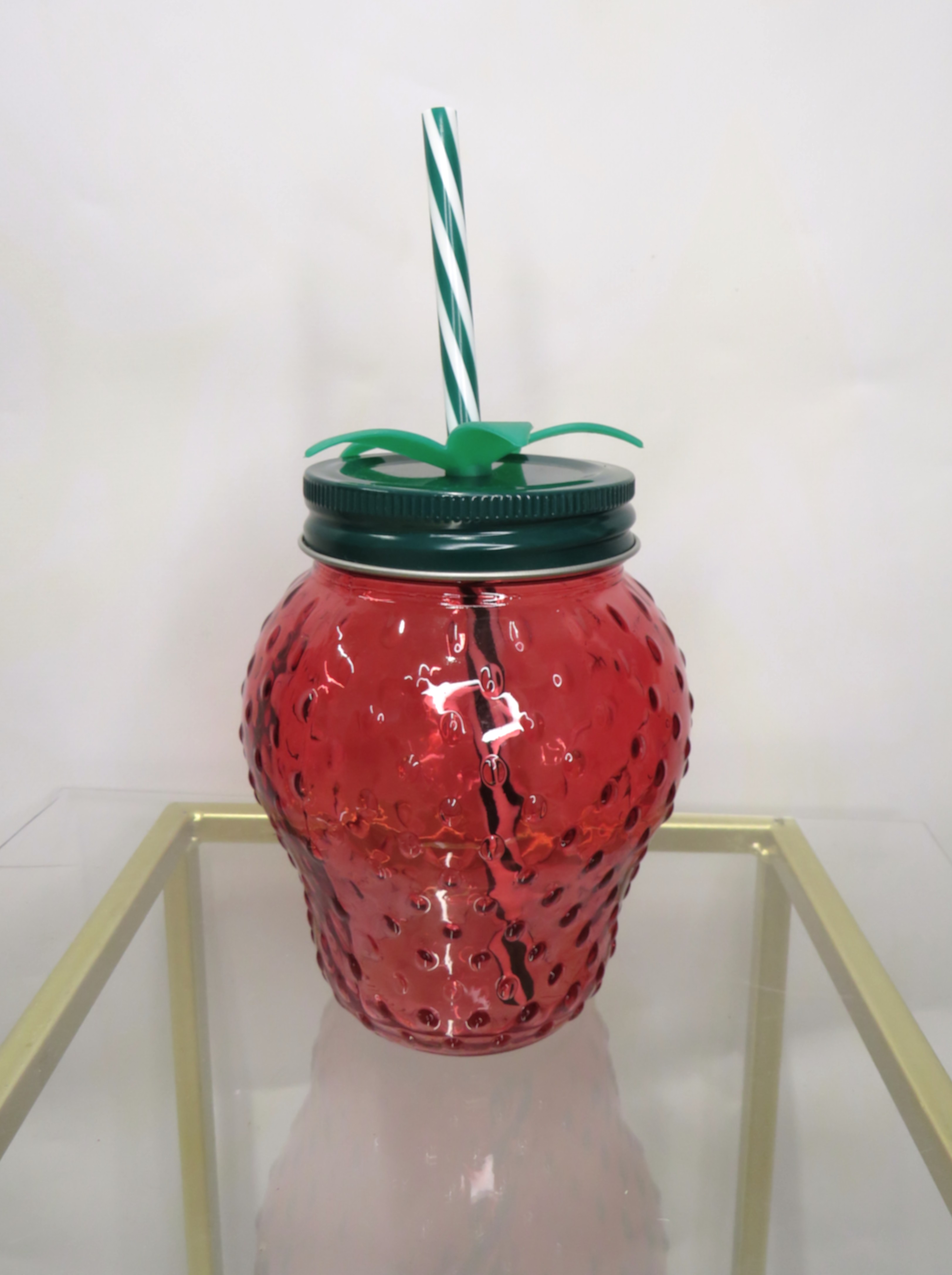 Bicchiere drink in vetro a fragola con cannuccia 