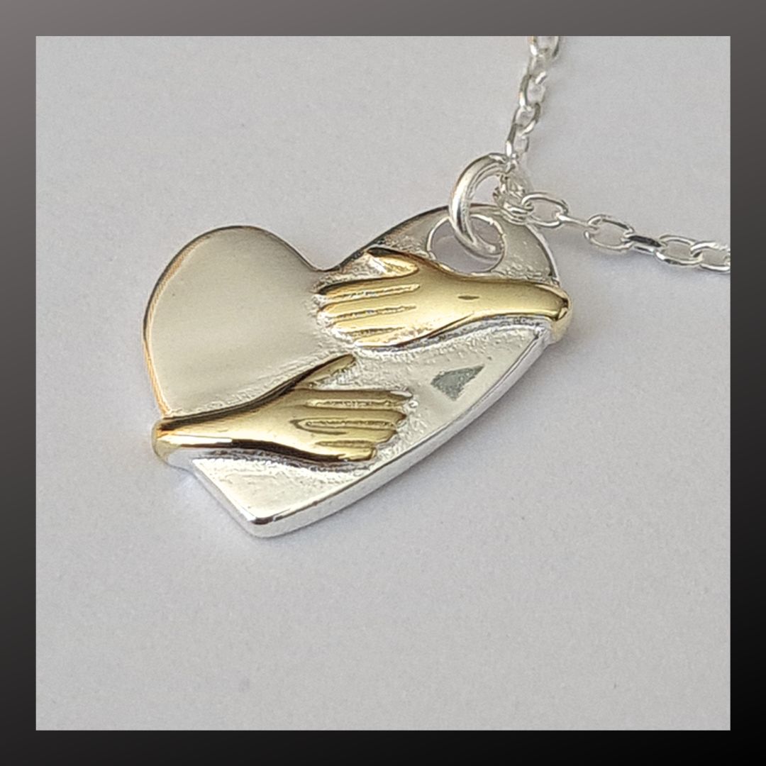 Collar corazón abrazado Plata 925 y Oro18k