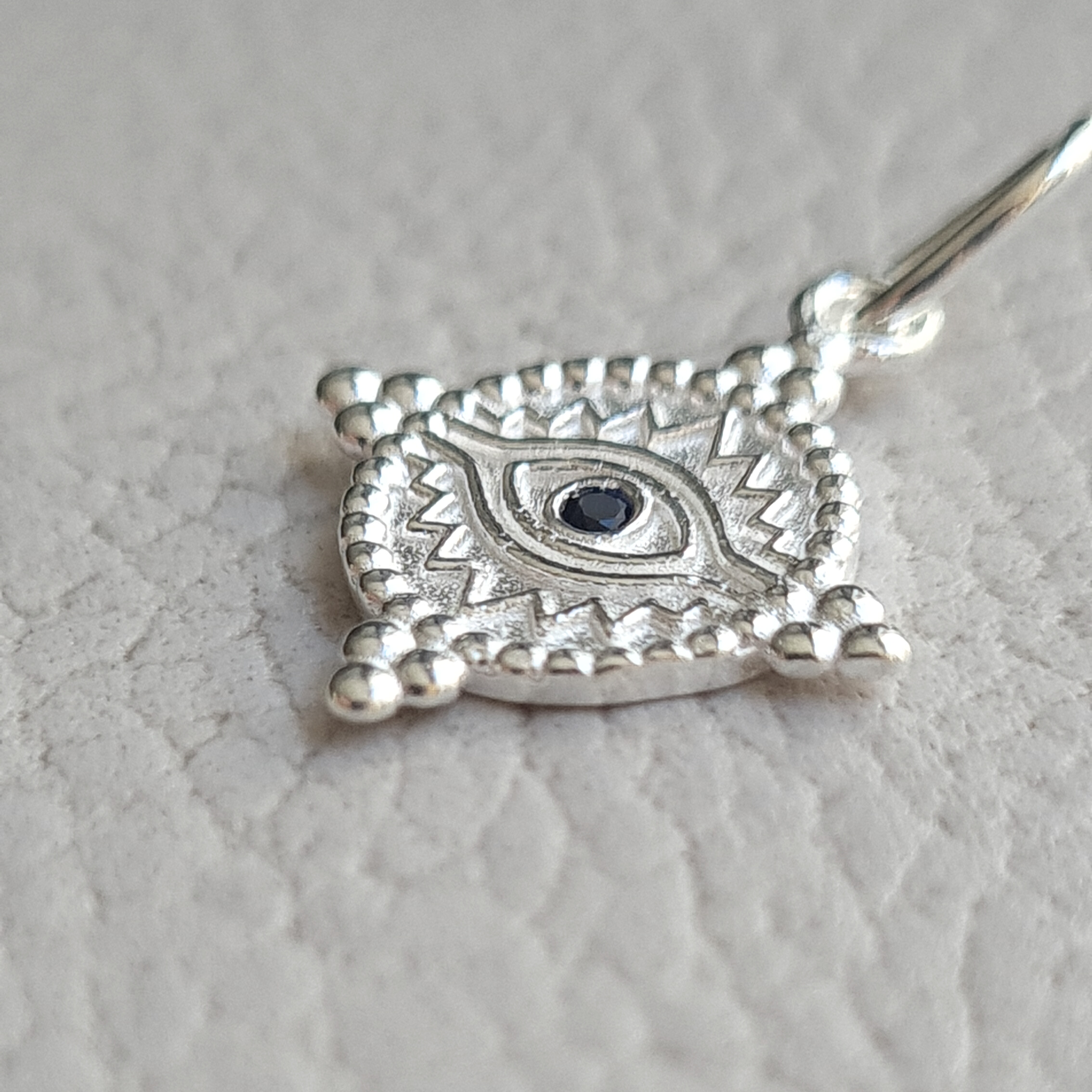 Dije ojo turco en Plata 925