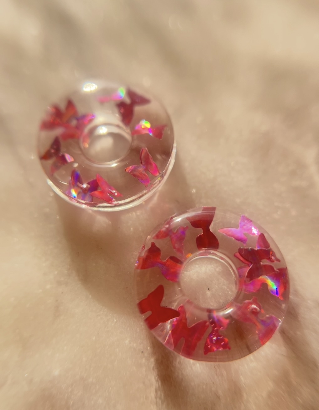 Louve papillon rose