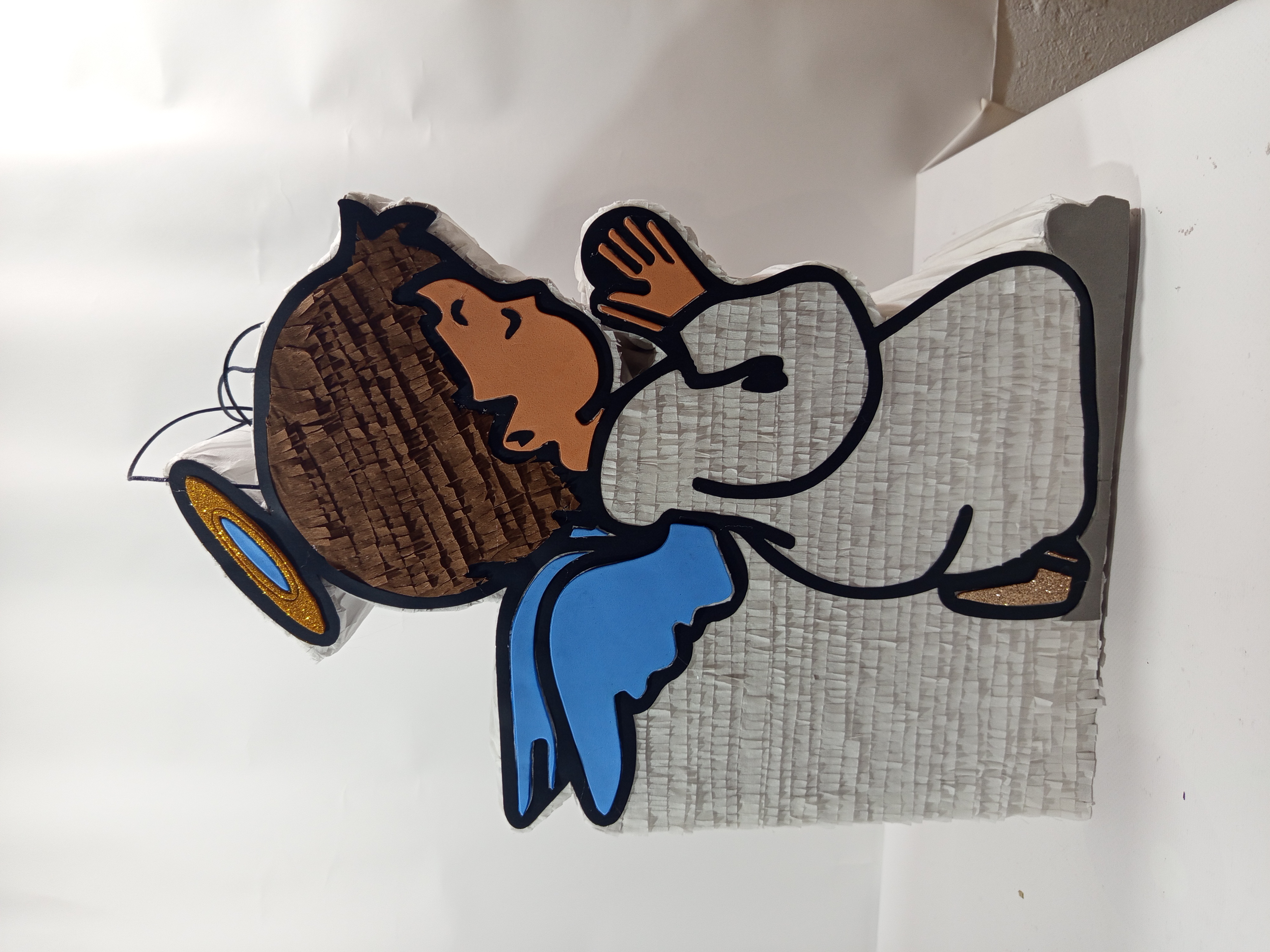 Piñata de ángel rezando