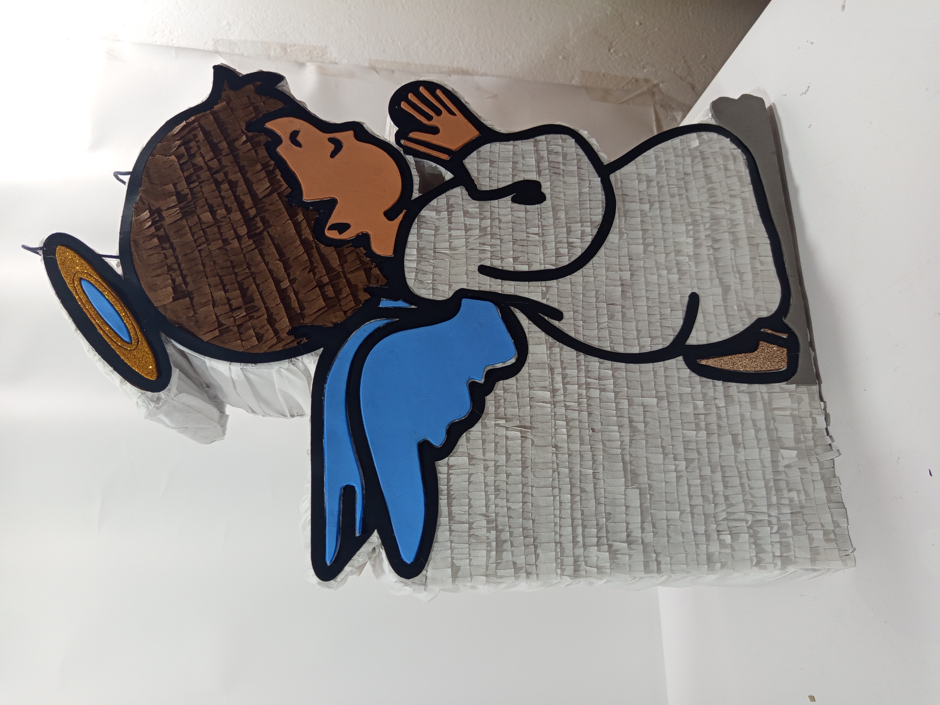 Piñata de ángel rezando