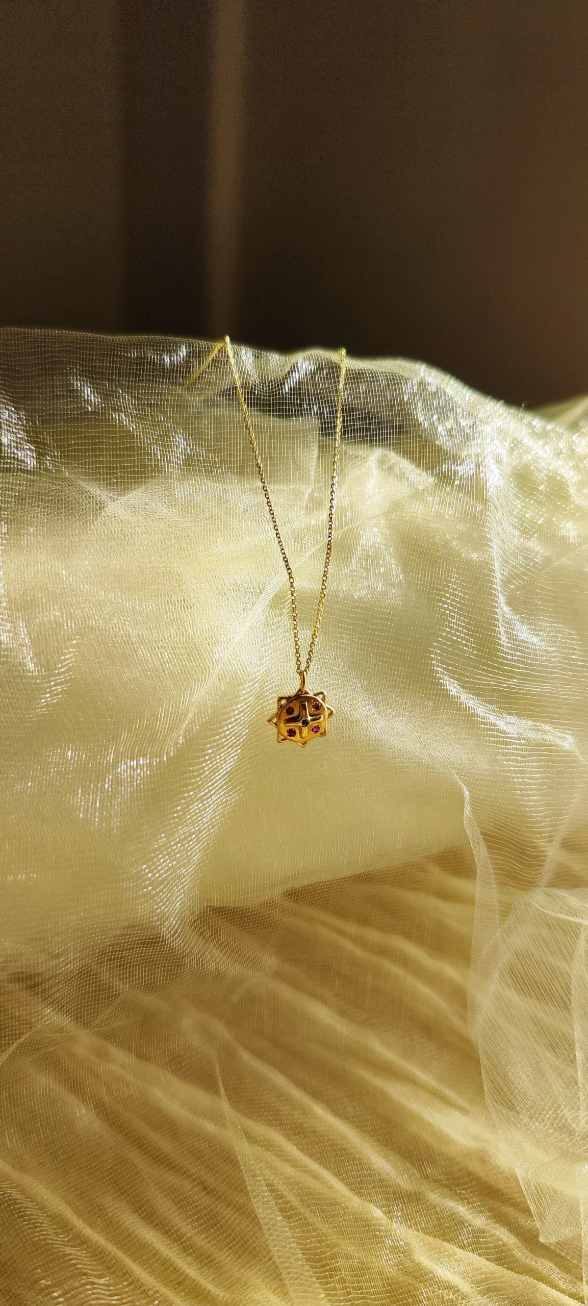 Colgante Llave de Saturno bañada en oro