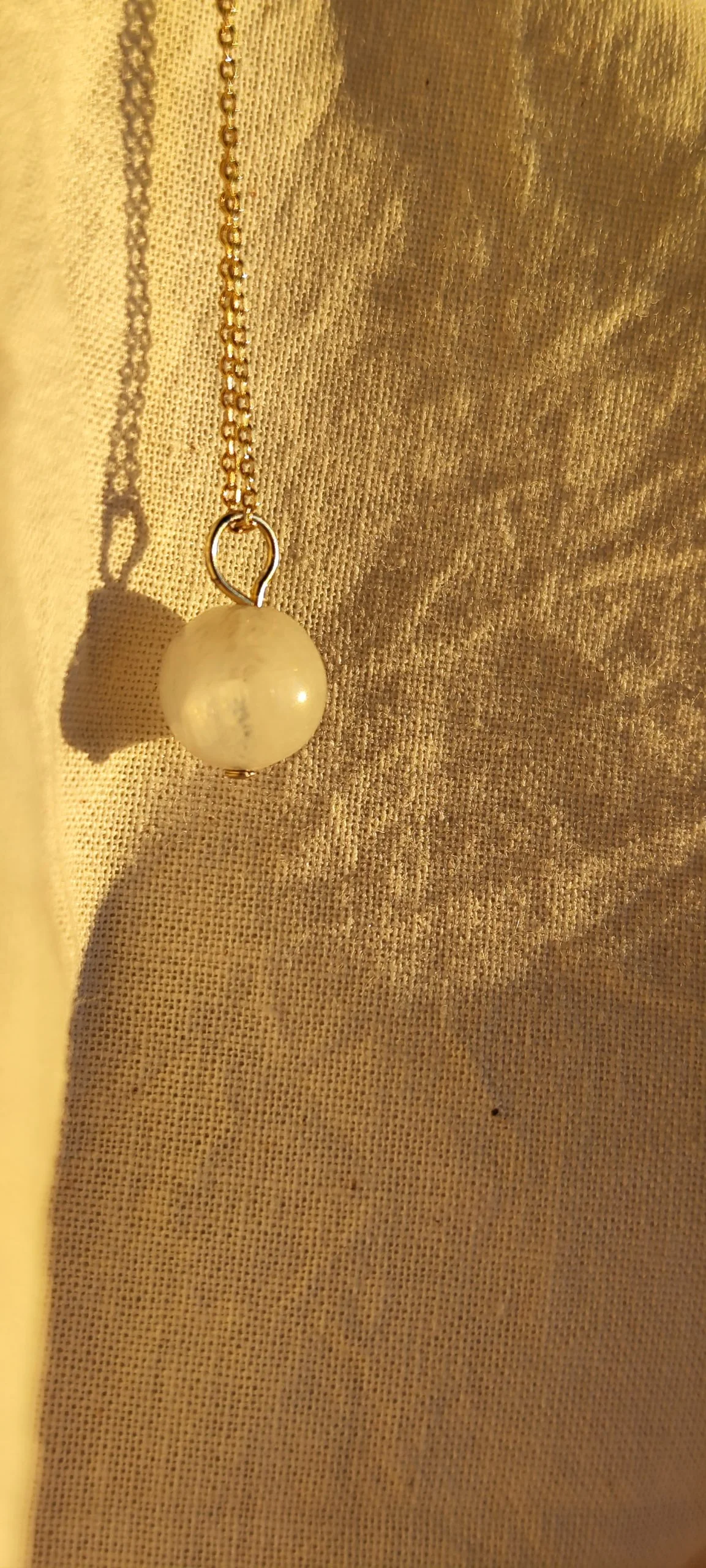 Colgante bola piedra luna 