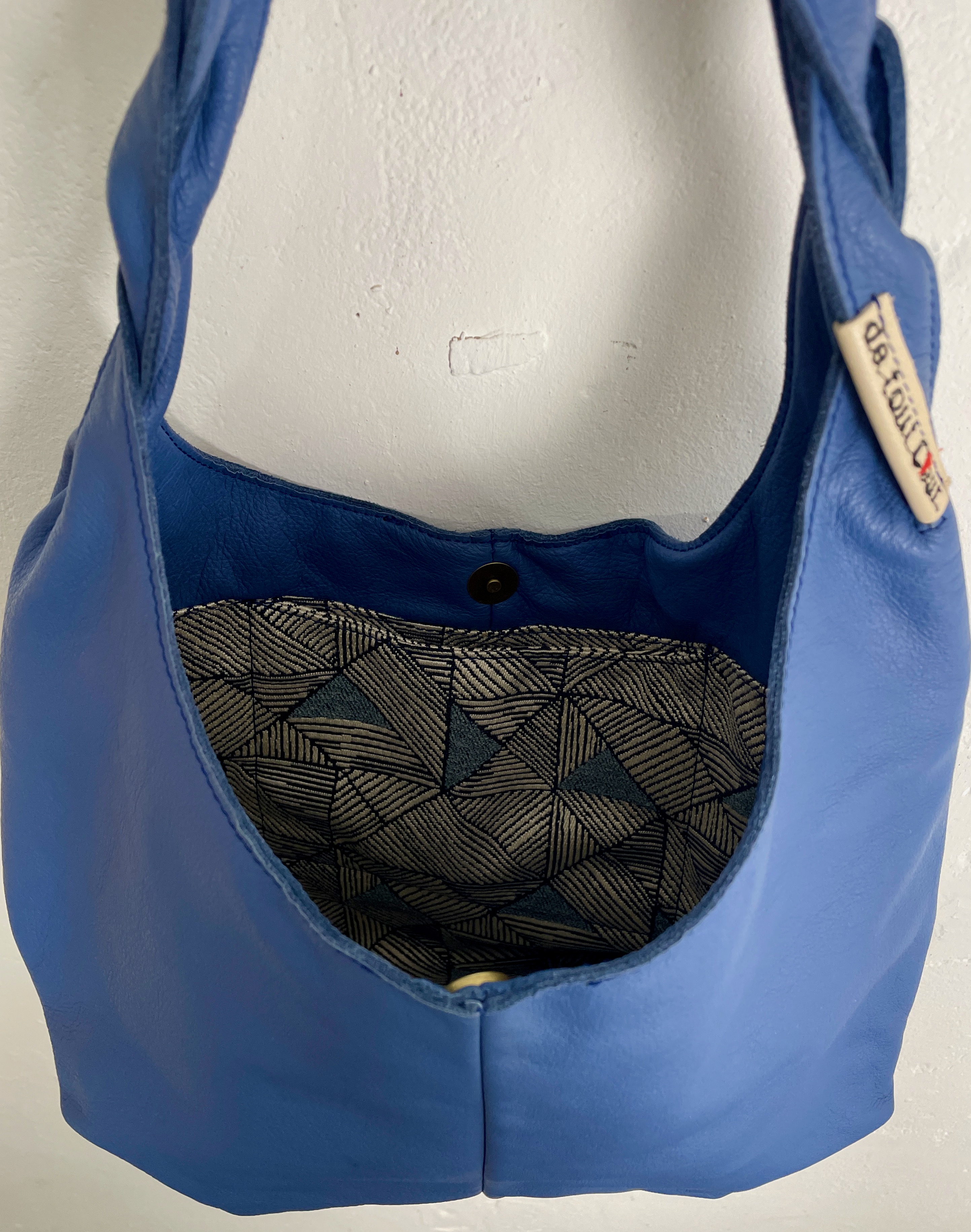 Sac cabas en cuir avec l'anse tressée 