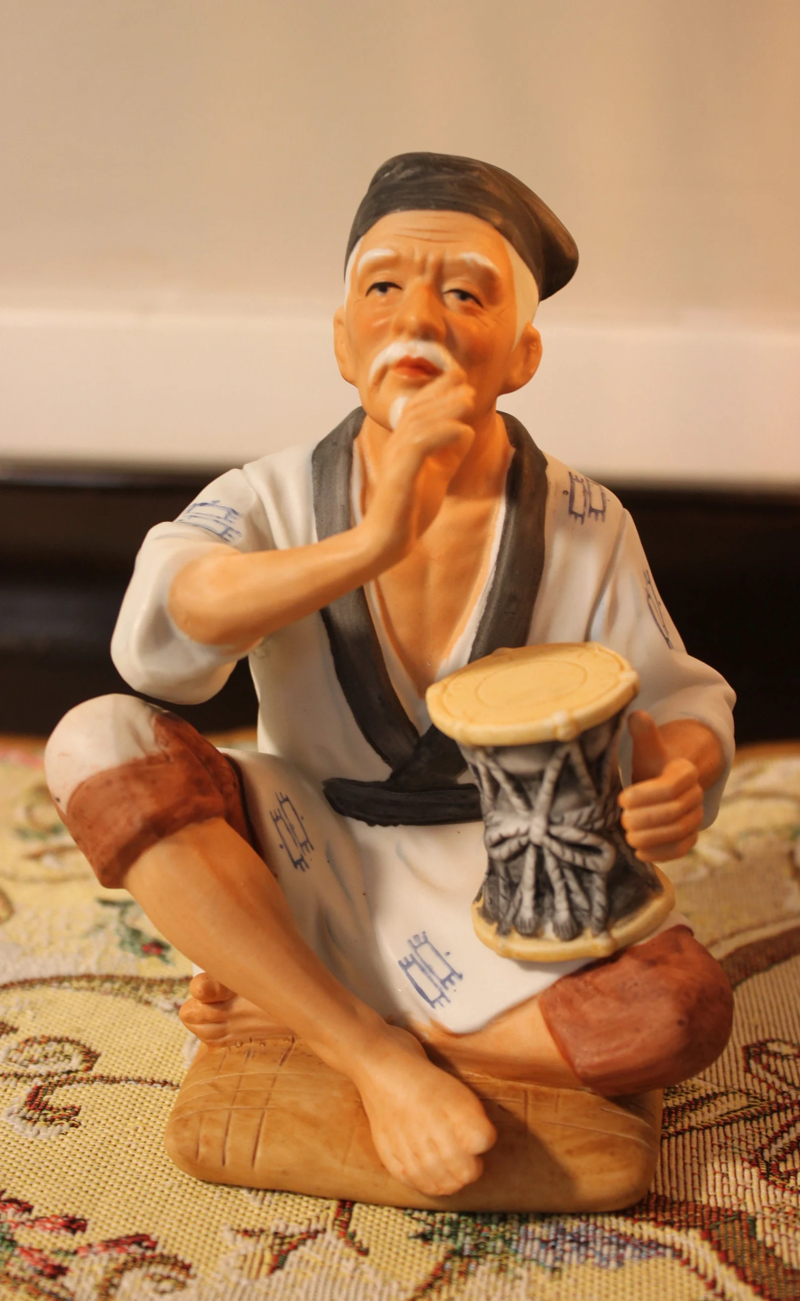 ARNART Porcelain man playing the drum figurine CIRCA 1970s