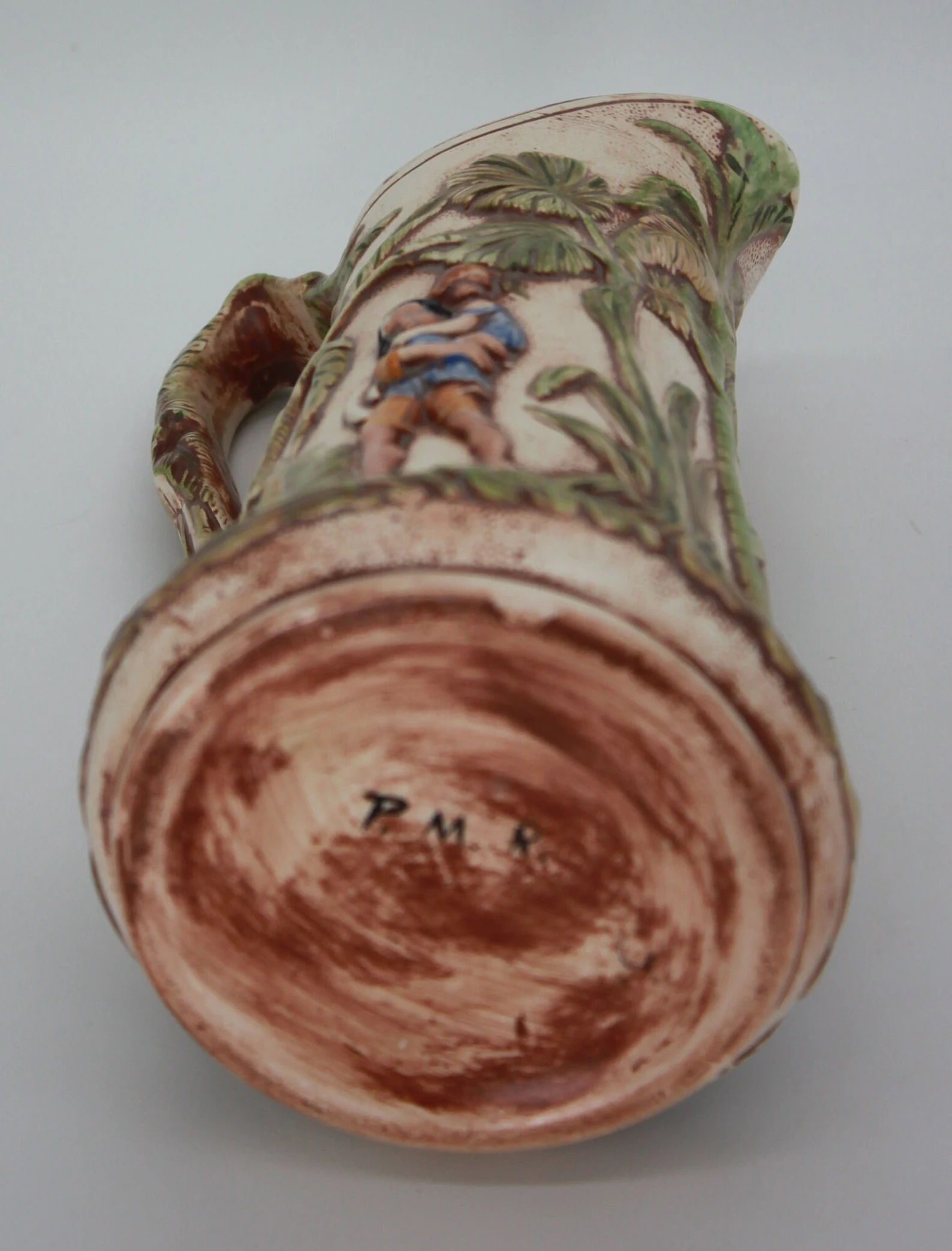 PMR ceramic white inside forest scene relief pitcher CIRCA 1970s