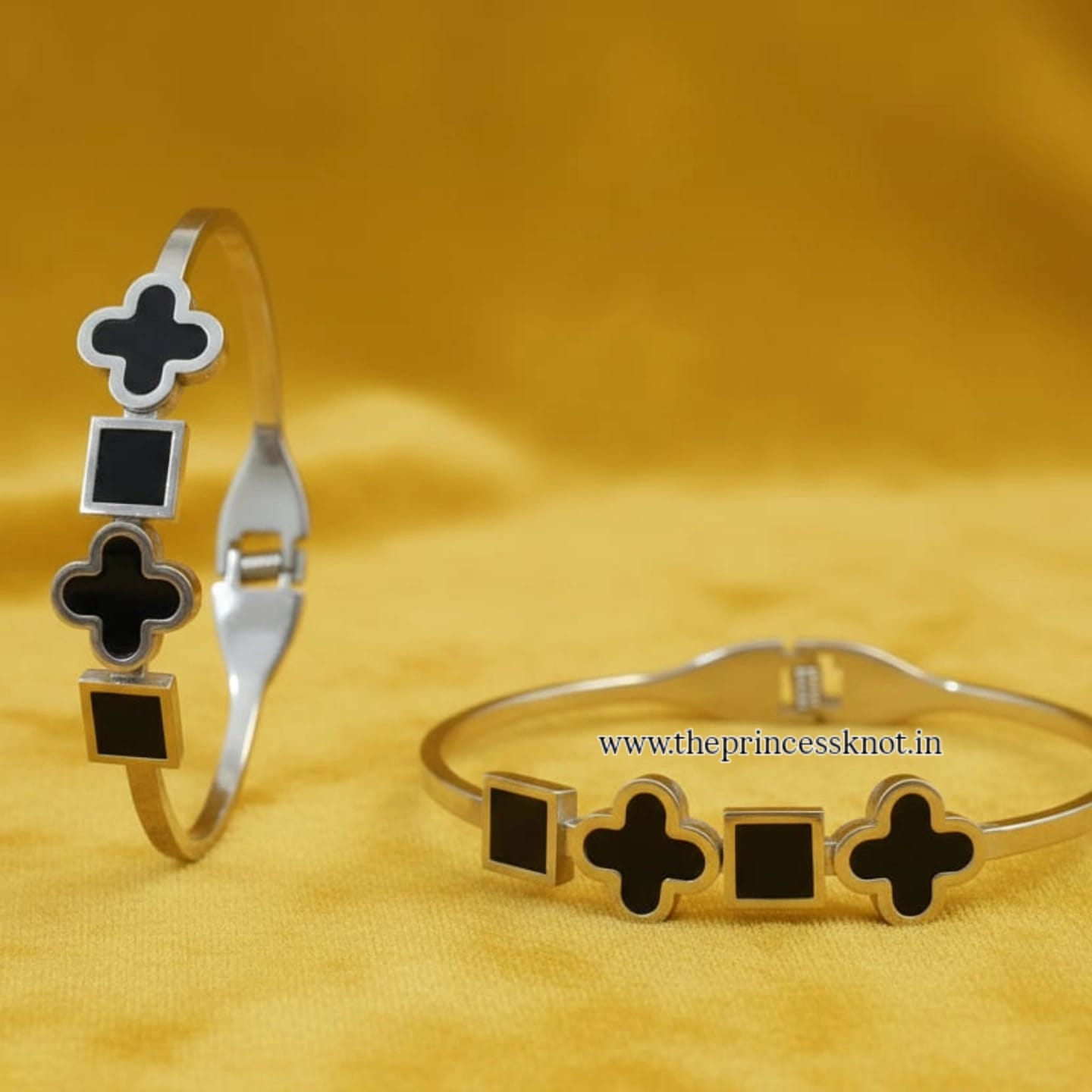 Elegant Silver Bracelet with Black Geometric Charms