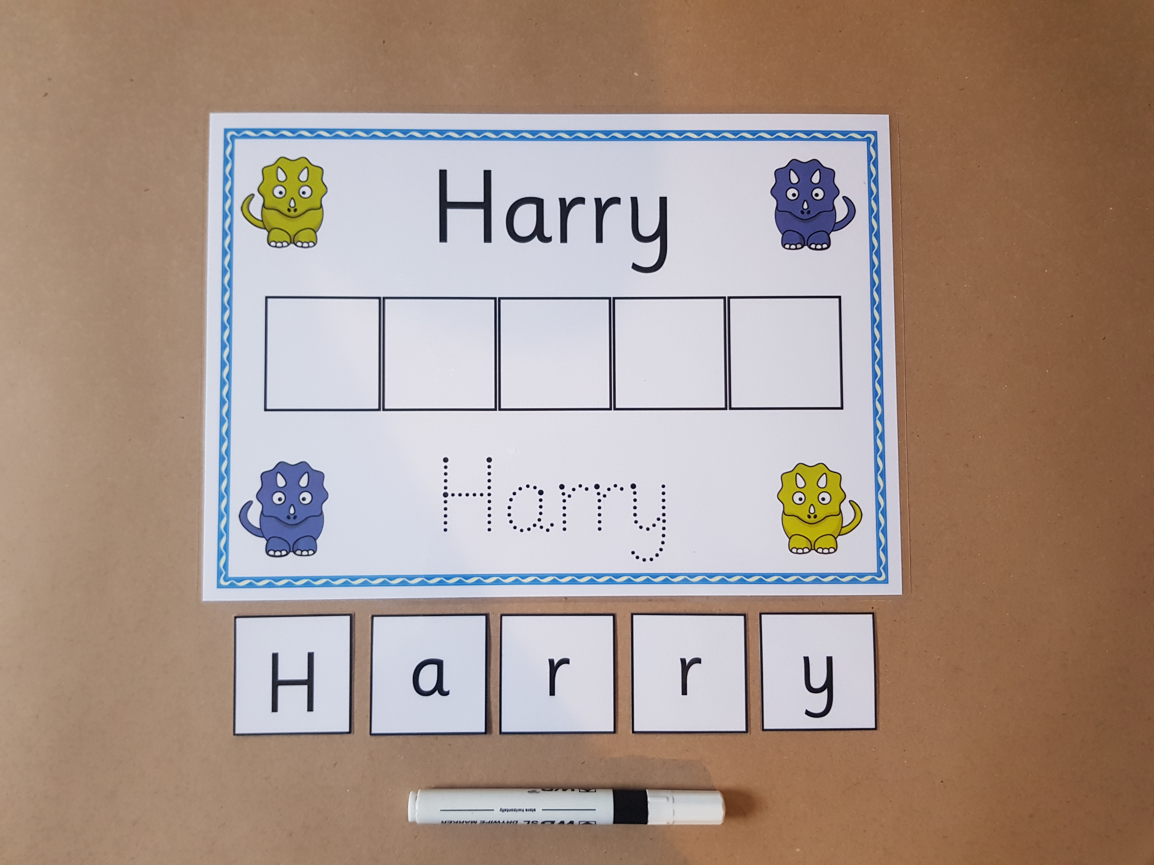 Write and Spell Name card - dinosaurs design 
